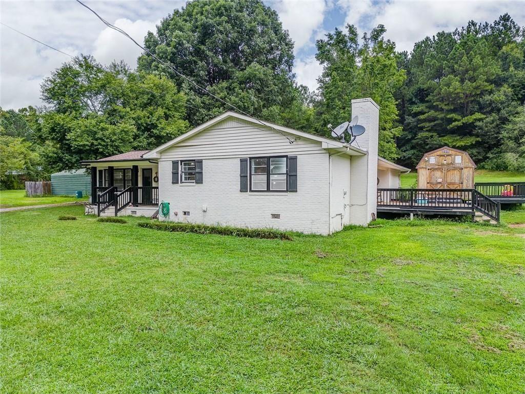 4244 Prior Station Road Cedartown, GA 30125 - Photo 4 of 51 a front view of house with yard and green space