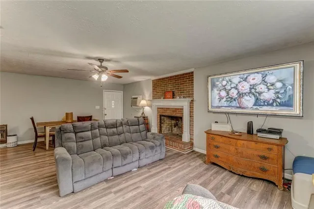 a bedroom with furniture and wooden floor