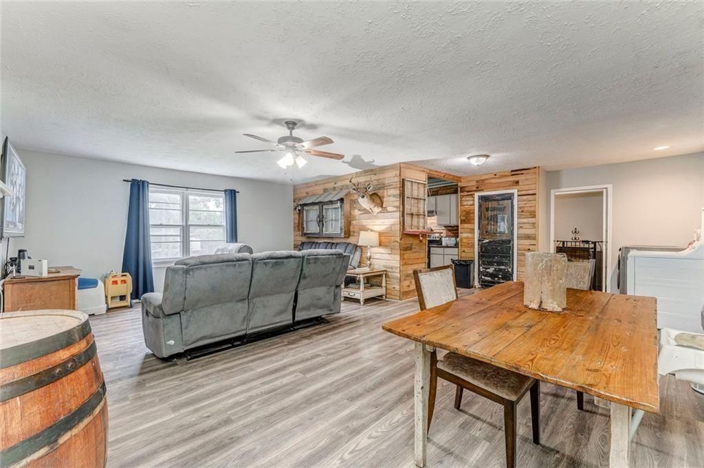 4244 Prior Station Road Cedartown, GA 30125 - Photo 44 of 51 a living room with furniture and wooden floor
