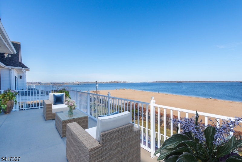 76 Raritan Reach Road South Amboy, NJ 08879 - Photo 20 of 42 a roof deck with couches and city view