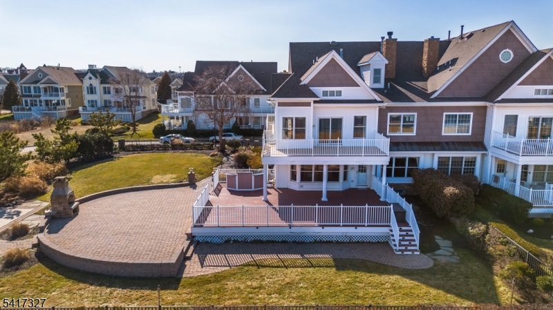 76 Raritan Reach Road South Amboy, NJ 08879 - Photo 32 of 42 a aerial view of a house with swimming pool and a yard