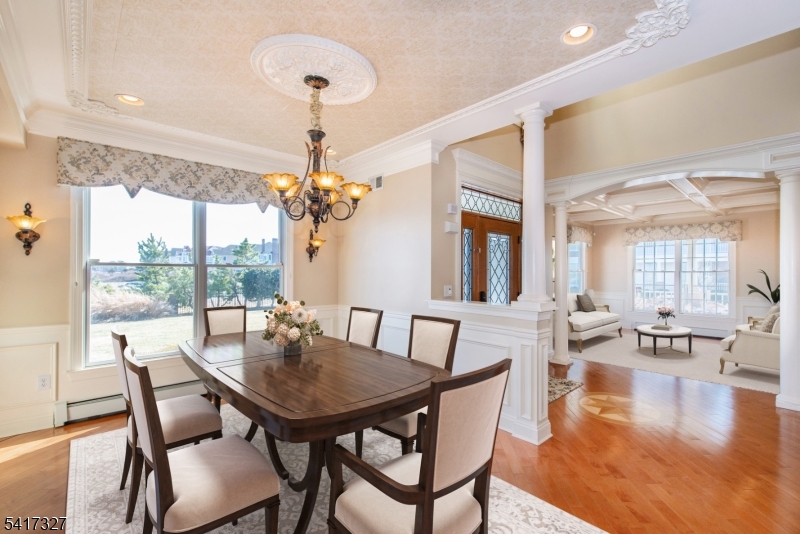 76 Raritan Reach Road South Amboy, NJ 08879 - Photo 6 of 42 a view of a dining room with furniture wooden floor and chandelier