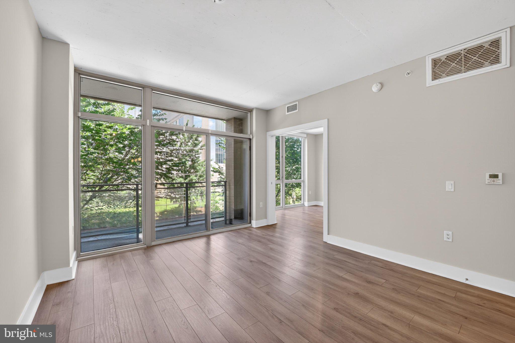 88 V Street Southwest, Unit 213 Washington, DC 20024 - Photo 15 of 26 Bright, airy space with nature views.