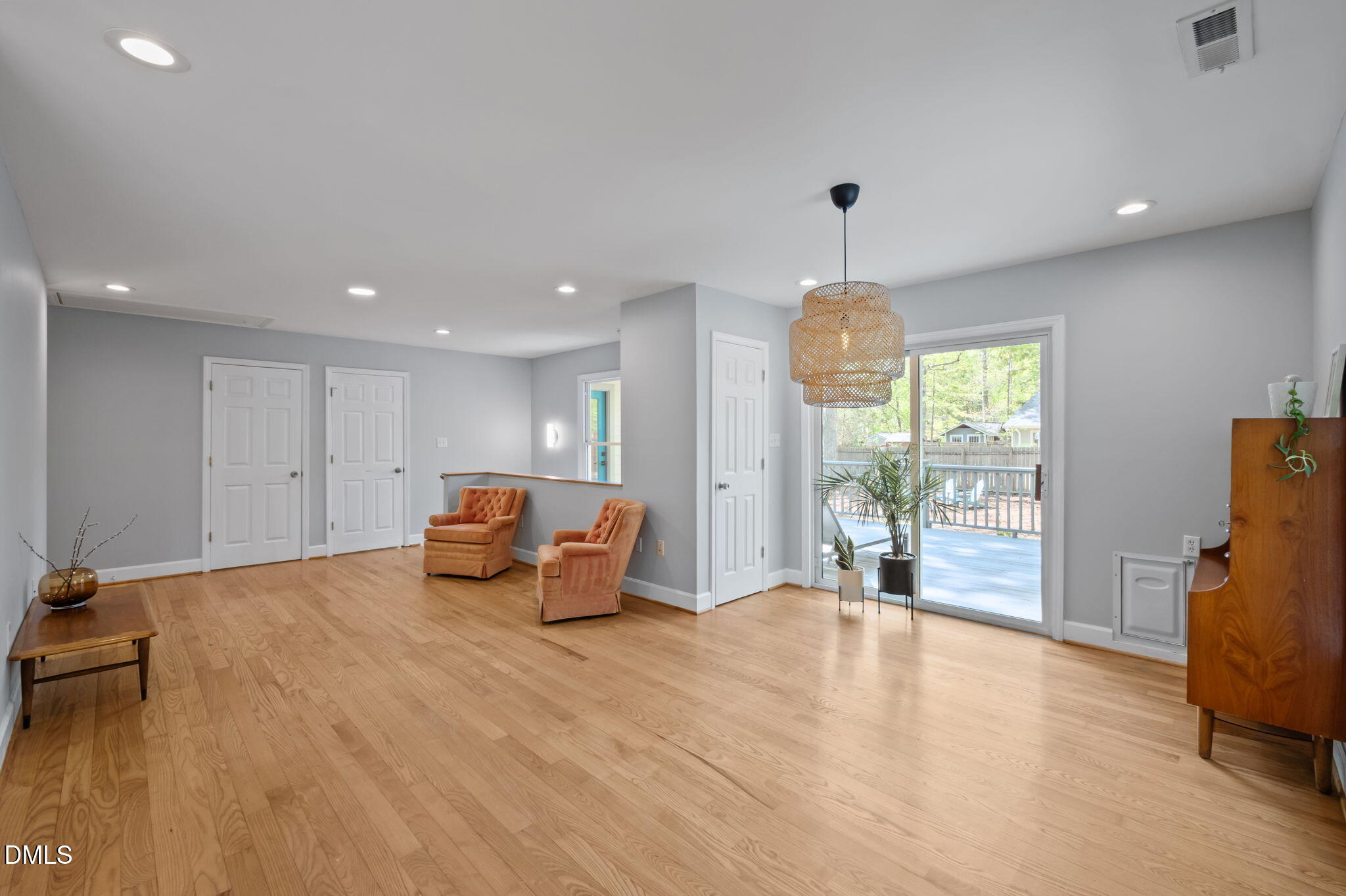 201 Simpson Street, Unit B Carrboro, NC 27510 - Photo 11 of 56 a very nice looking room with a large window and chandelier