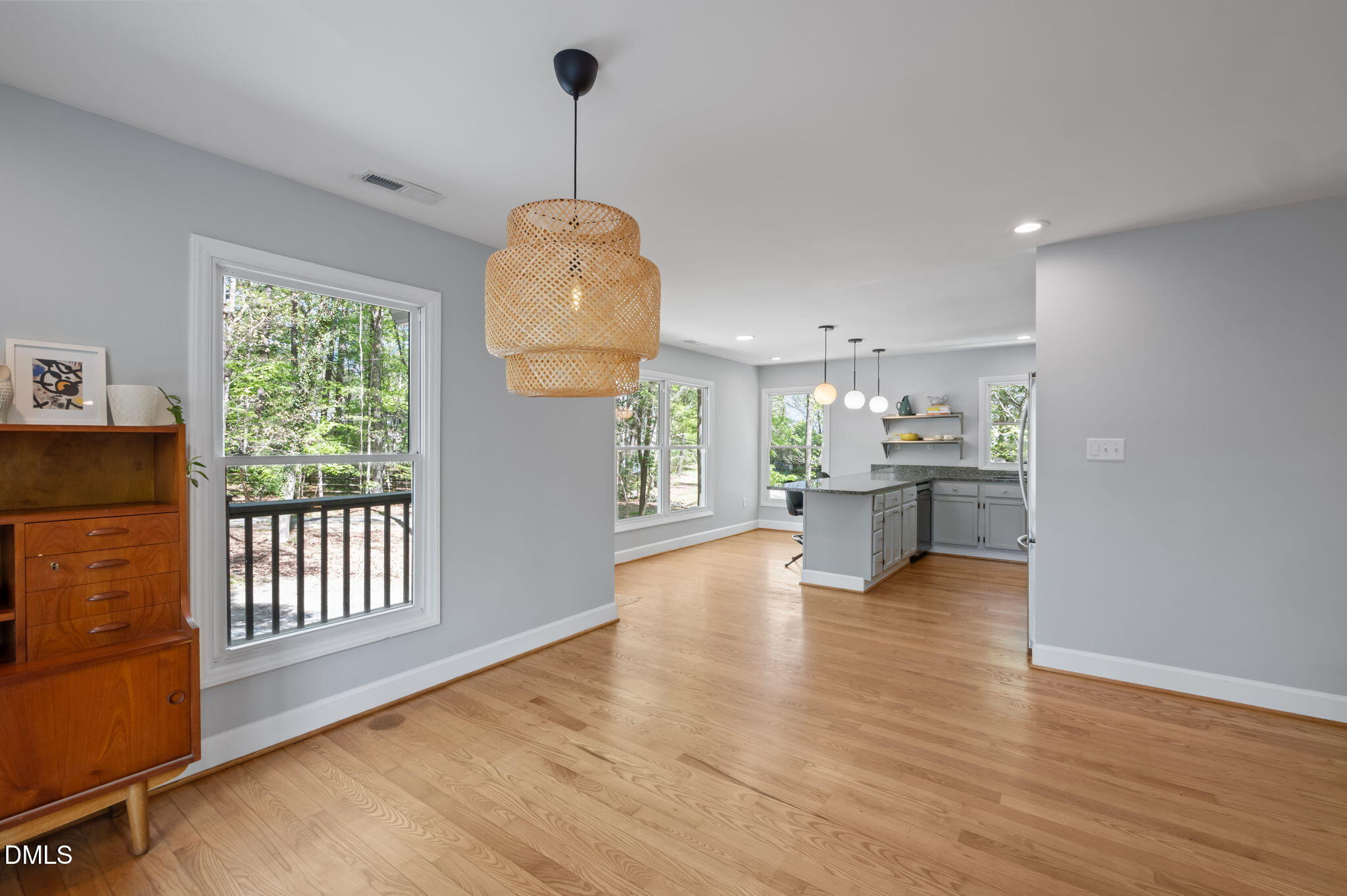 201 Simpson Street, Unit B Carrboro, NC 27510 - Photo 12 of 56 a view of an empty room window and wooden floor