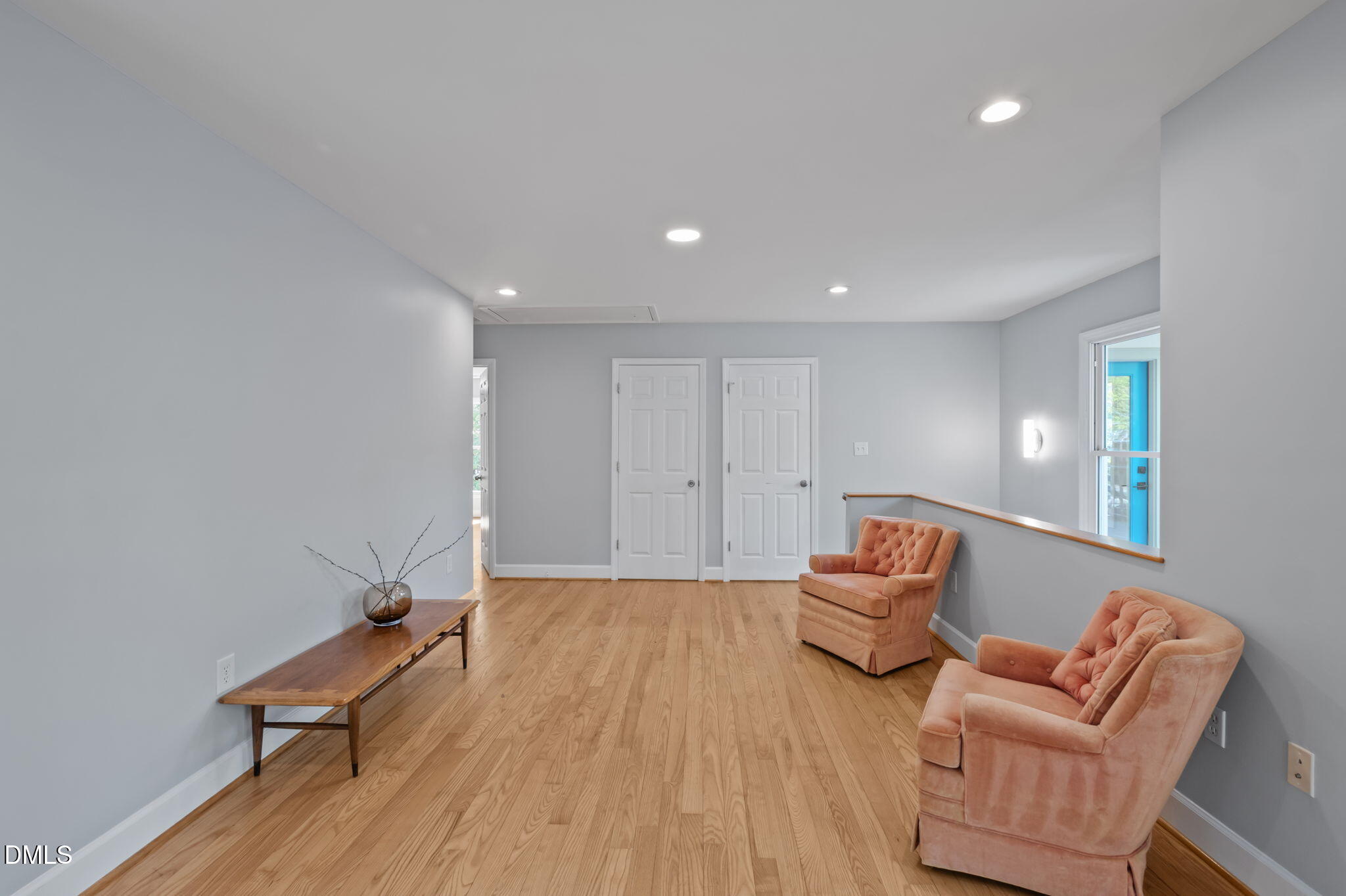 201 Simpson Street, Unit B Carrboro, NC 27510 - Photo 13 of 56 a living room with furniture and wooden floor