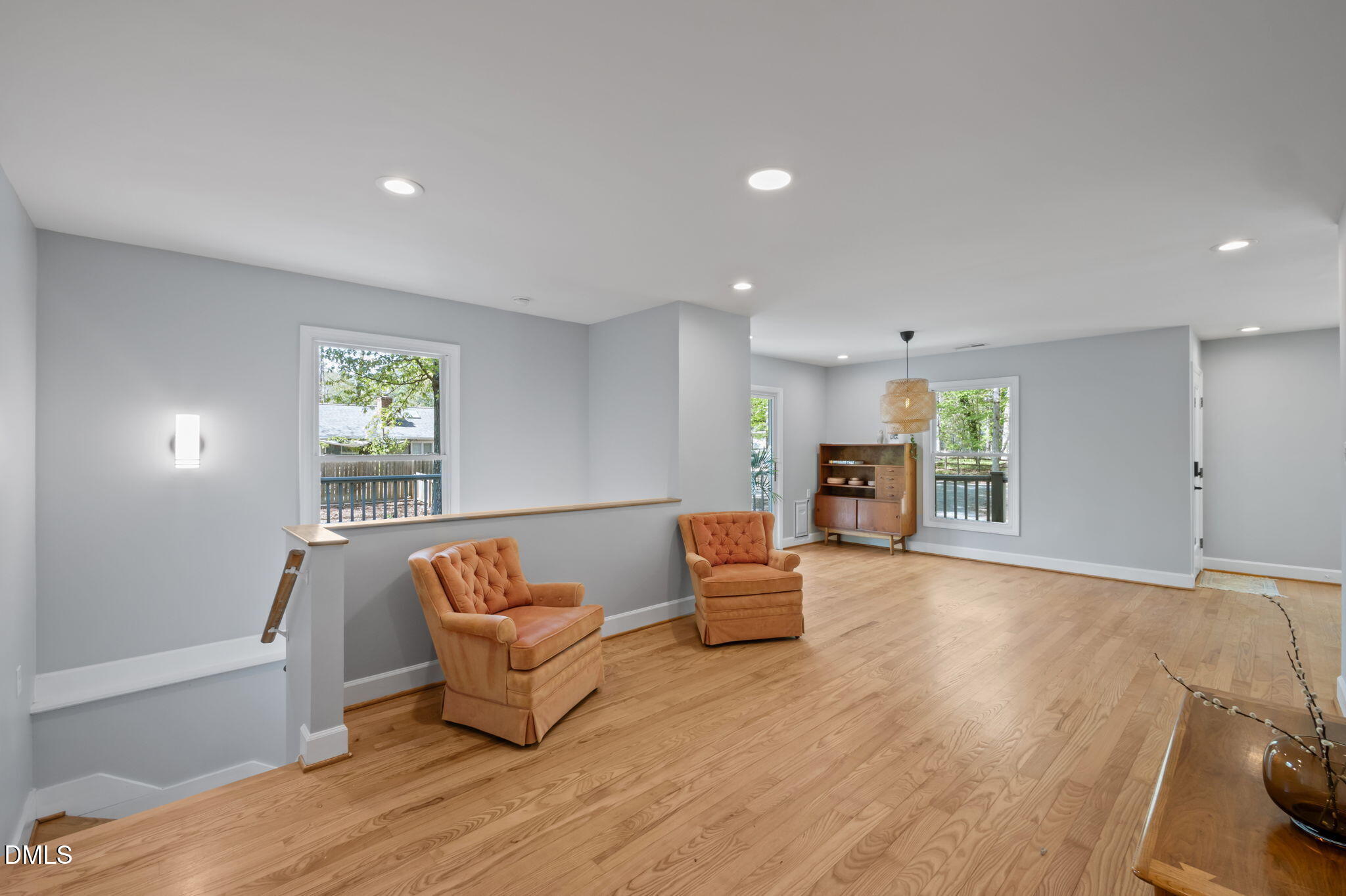 201 Simpson Street, Unit B Carrboro, NC 27510 - Photo 14 of 56 a living room with furniture and a wooden floor