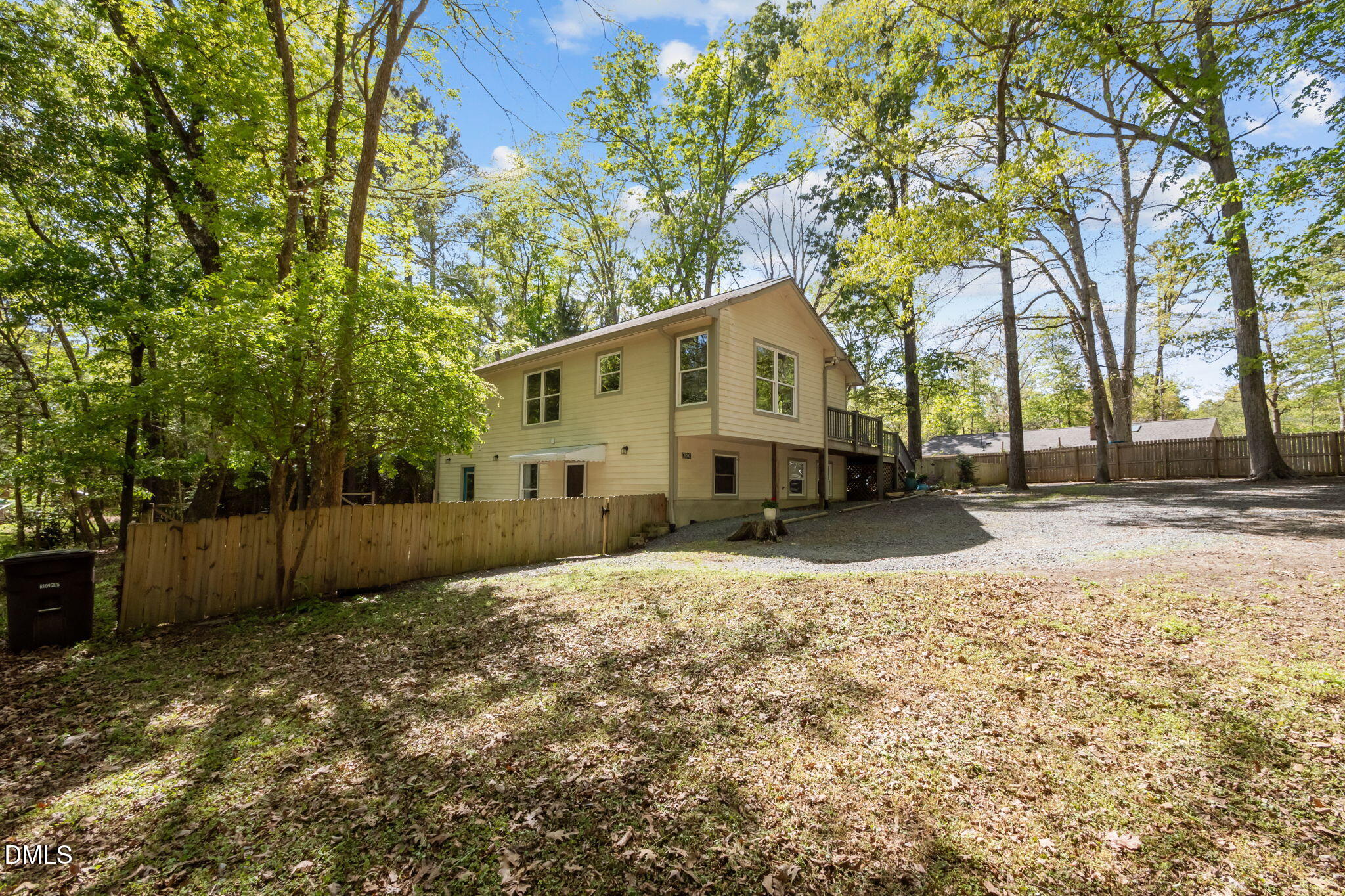 201 Simpson Street, Unit B Carrboro, NC 27510 - Photo 24 of 56 a view of a house with a yard covered in snow