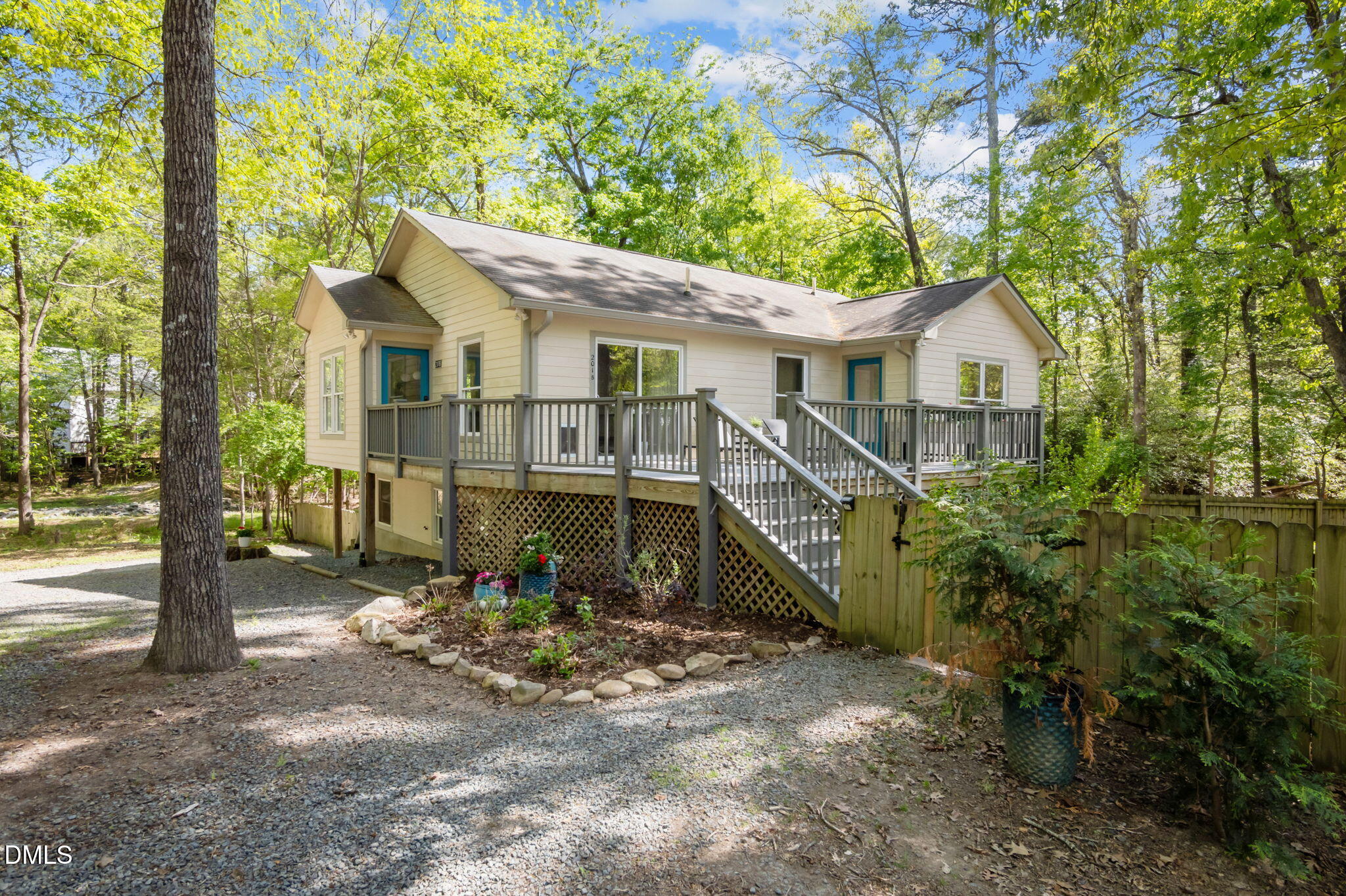 201 Simpson Street, Unit B Carrboro, NC 27510 - Photo 25 of 56 a view of a house with a yard and large trees