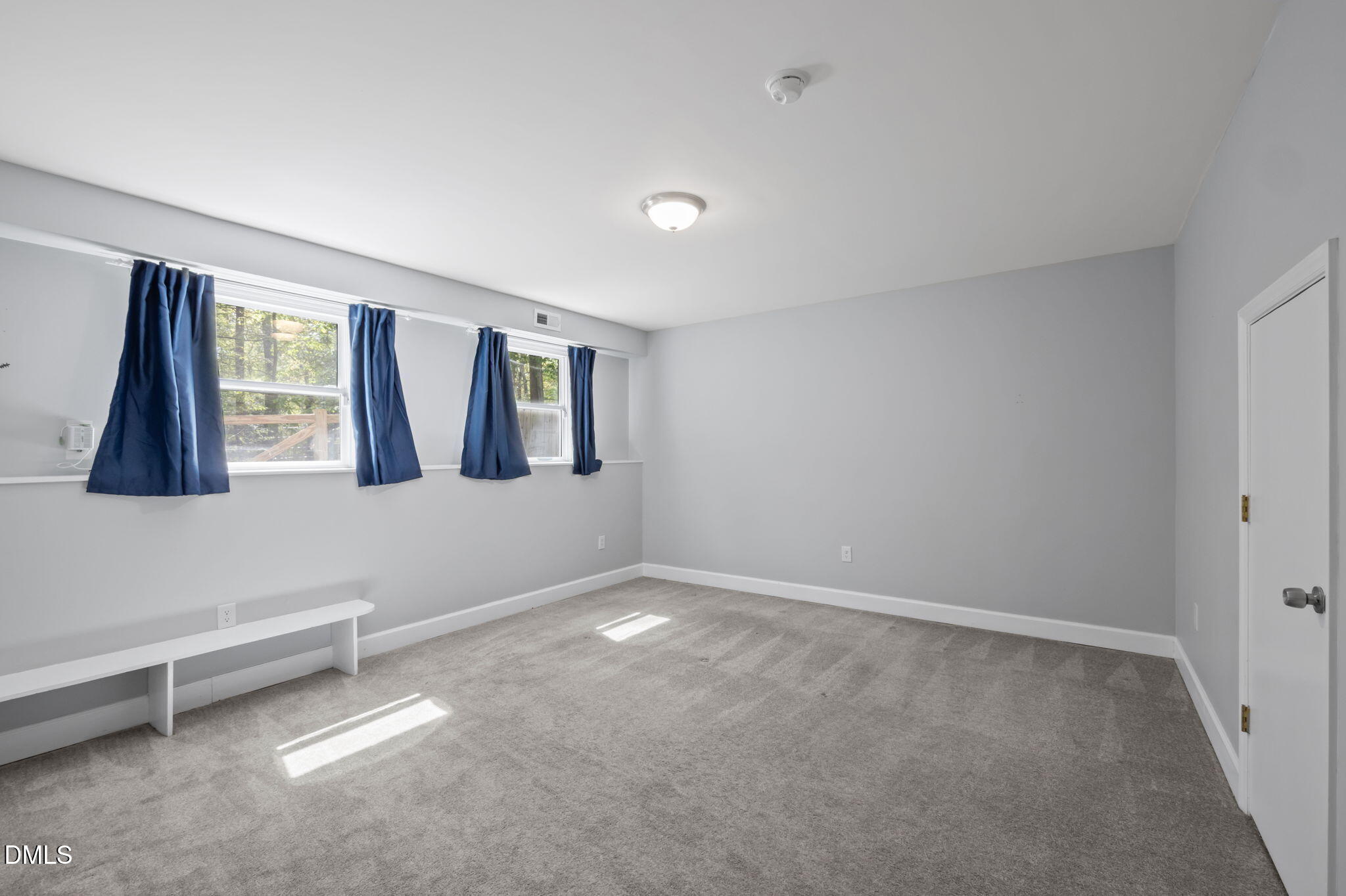 201 Simpson Street, Unit B Carrboro, NC 27510 - Photo 33 of 56 a view of an empty room with window