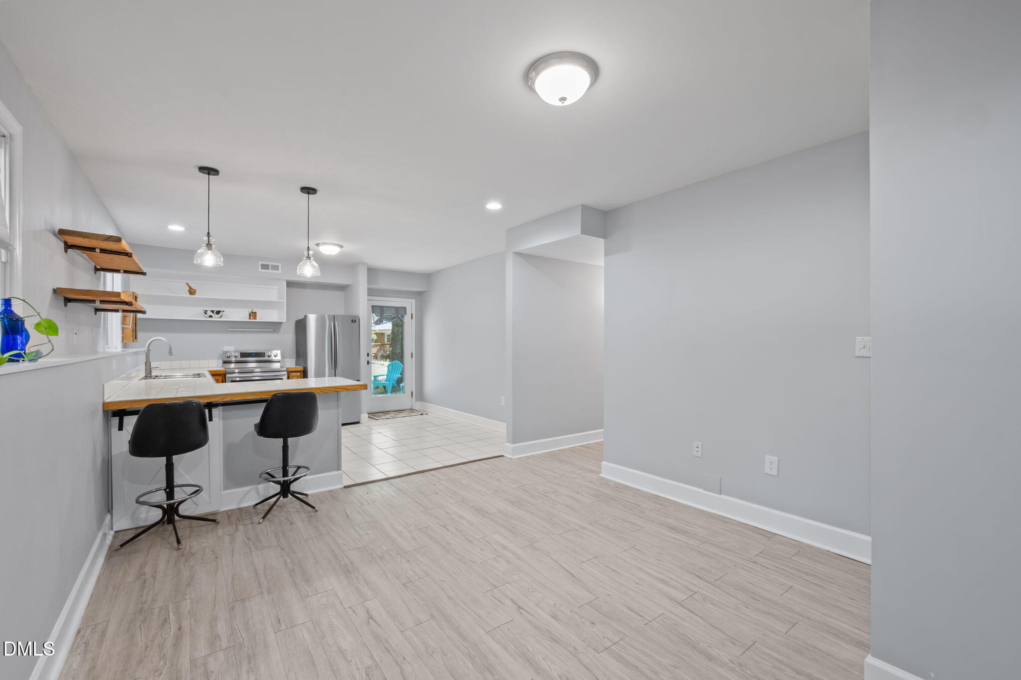 201 Simpson Street, Unit B Carrboro, NC 27510 - Photo 37 of 56 a view of a kitchen and dining room
