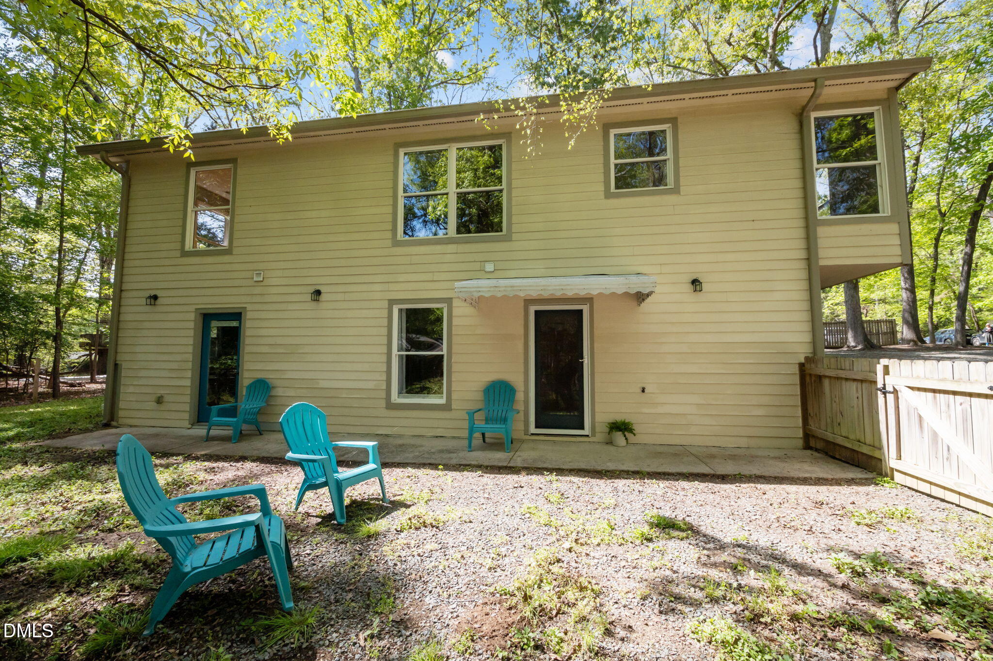 201 Simpson Street, Unit B Carrboro, NC 27510 - Photo 39 of 56 a backyard of a house with outdoor seating