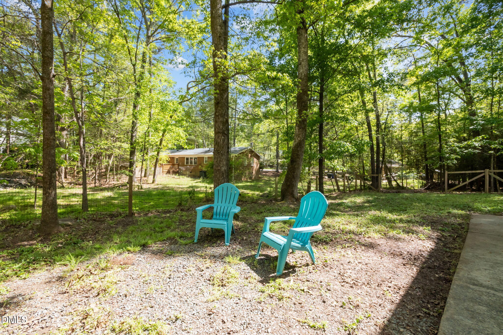 201 Simpson Street, Unit B Carrboro, NC 27510 - Photo 43 of 56 a view of a two chairs in a backyard