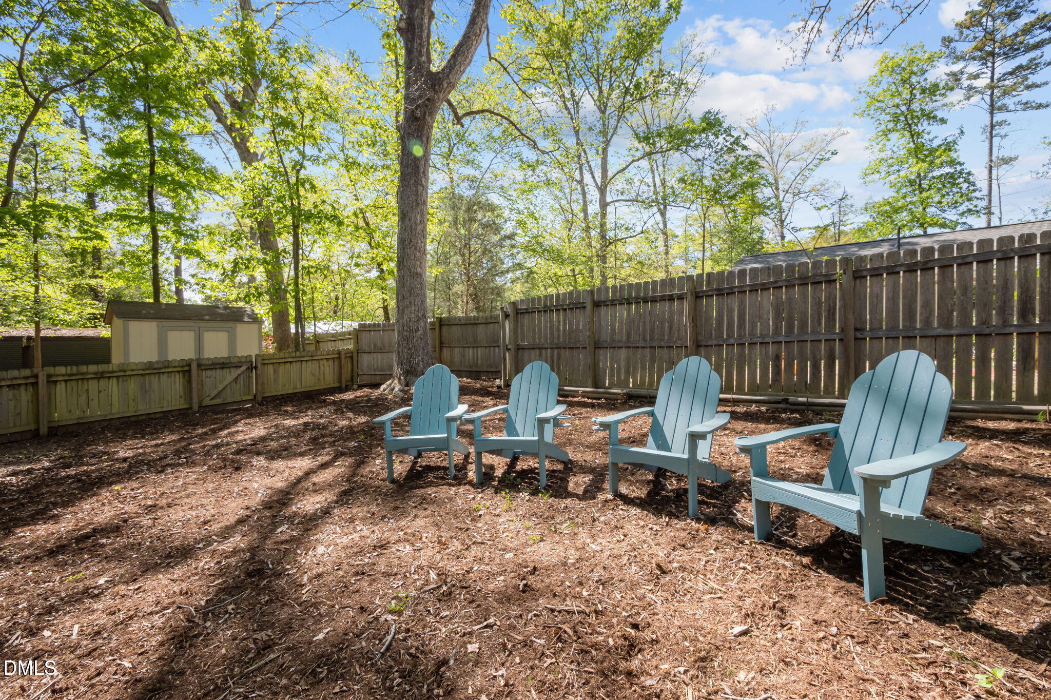 201 Simpson Street, Unit B Carrboro, NC 27510 - Photo 45 of 56 a view of a bench in a backyard