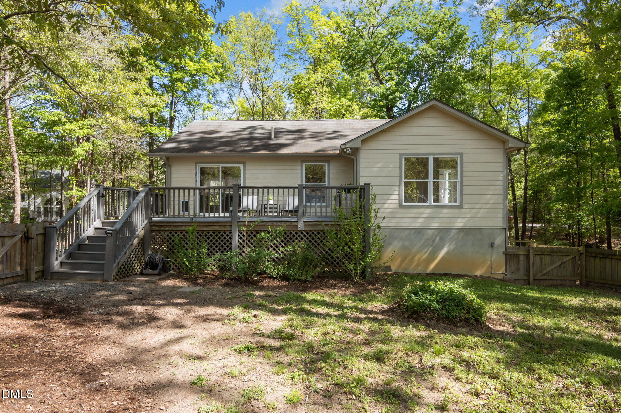 201 Simpson Street, Unit B Carrboro, NC 27510 - Photo 49 of 56 a front view of a house with garden