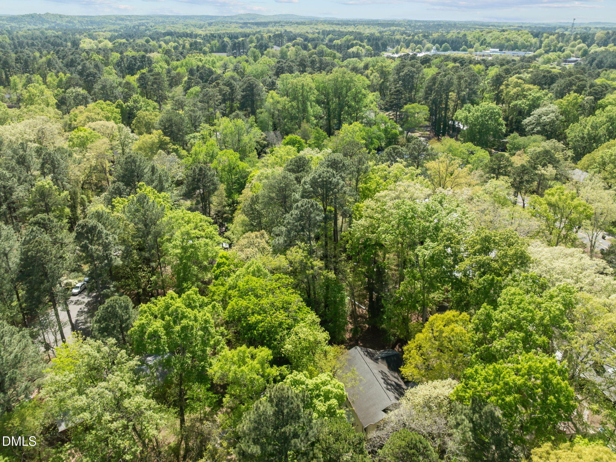 201 Simpson Street, Unit B Carrboro, NC 27510 - Photo 54 of 56 an aerial view of residential house with outdoor space and trees all around
