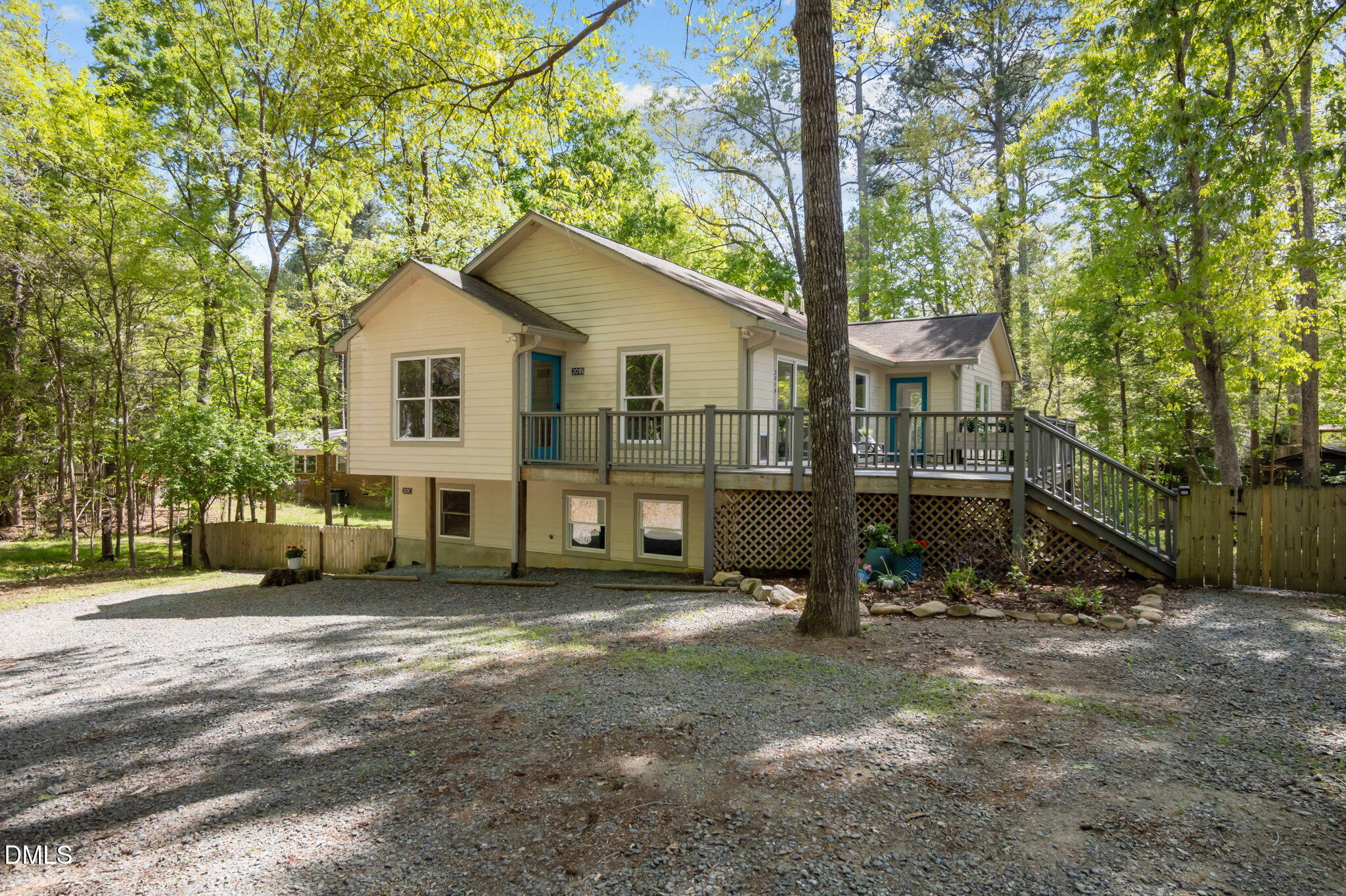 201 Simpson Street, Unit B Carrboro, NC 27510 - Photo 55 of 56 a view of a house with a yard and large trees