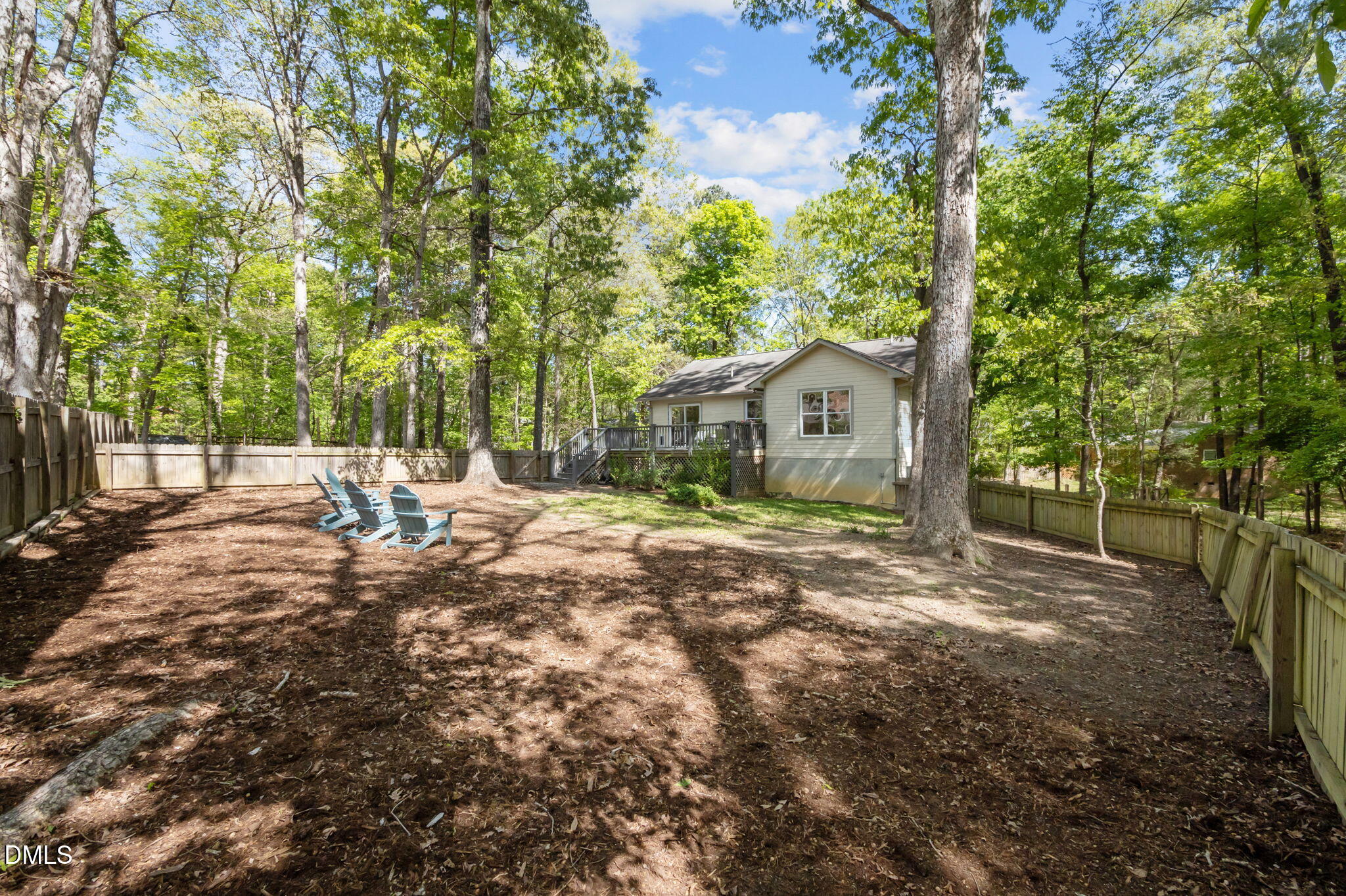 201 Simpson Street, Unit B Carrboro, NC 27510 - Photo 6 of 56 a backyard of a house with table and chairs