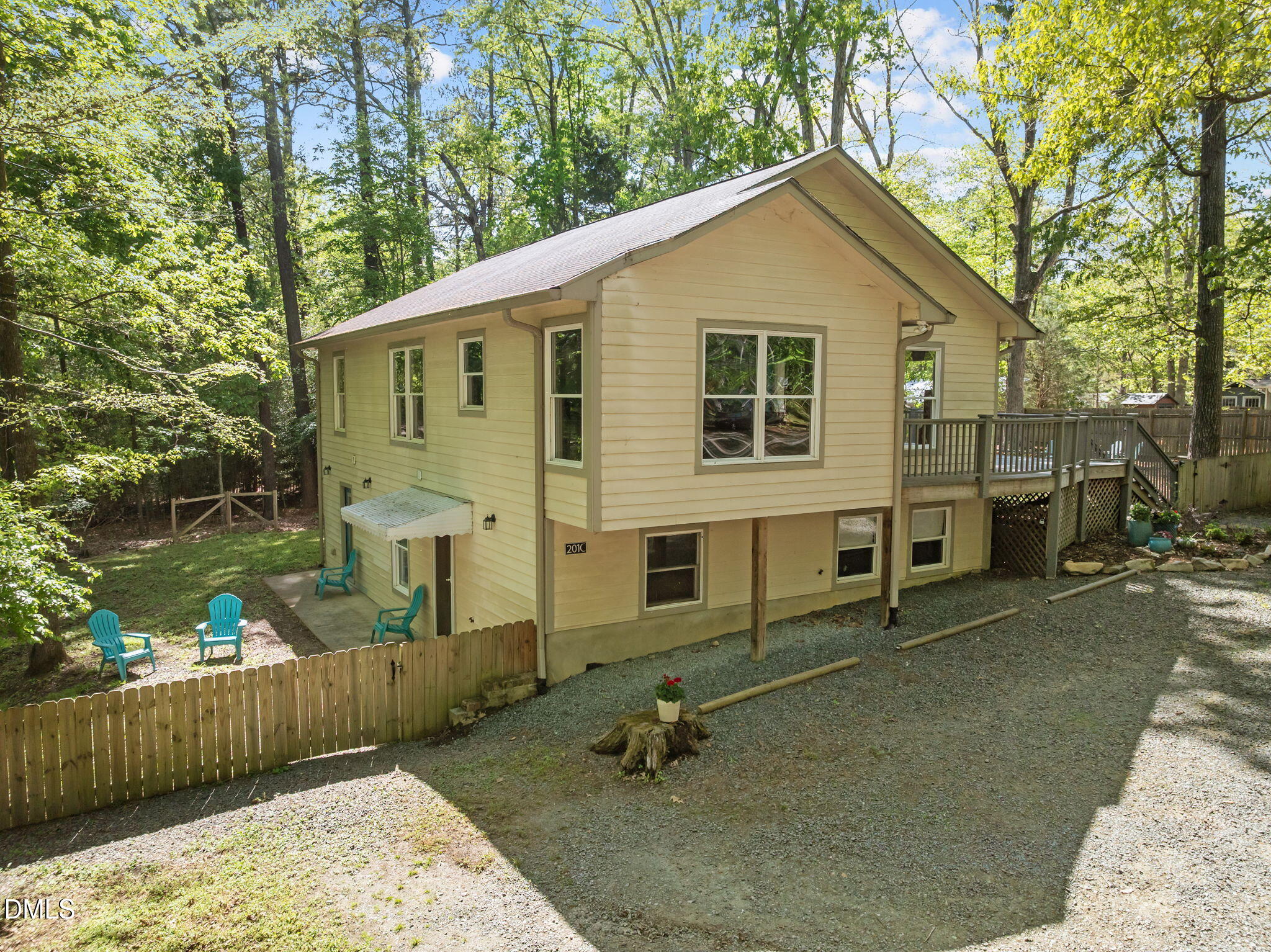 201 Simpson Street, Unit B Carrboro, NC 27510 - Photo 7 of 56 a front view of a house with garden
