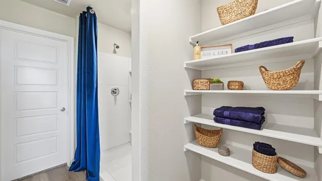 a bathroom with 2 sink and a mirror