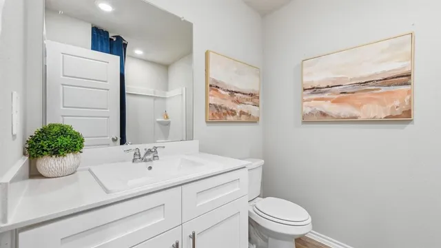 a bedroom with bed and window