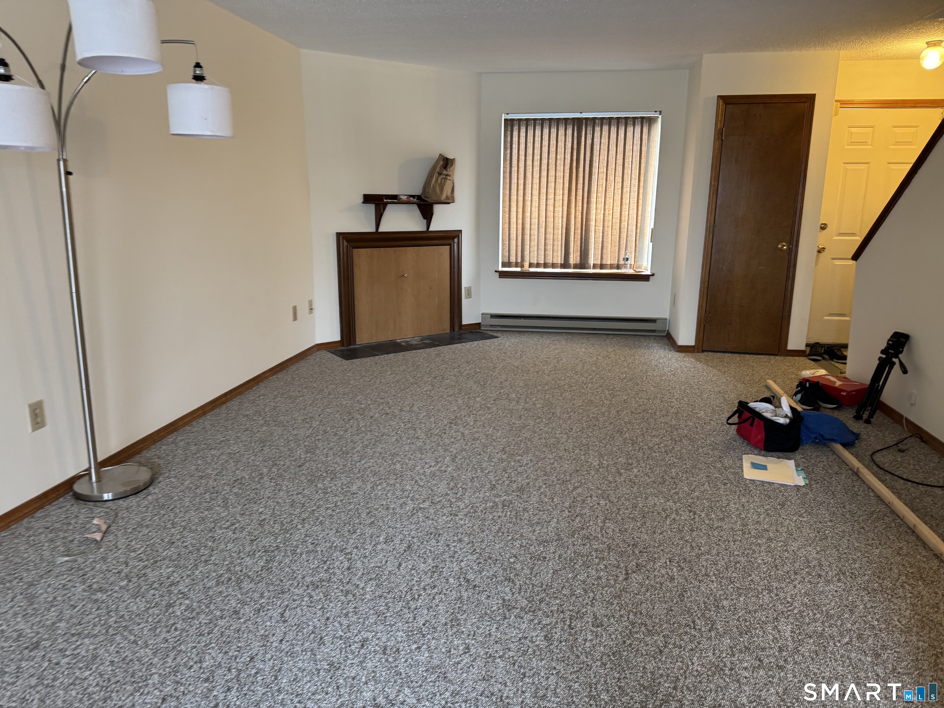 151 Shelter Rock Road, Unit 81 Danbury, CT 06810 - Photo 4 of 4 an empty room with windows and closet