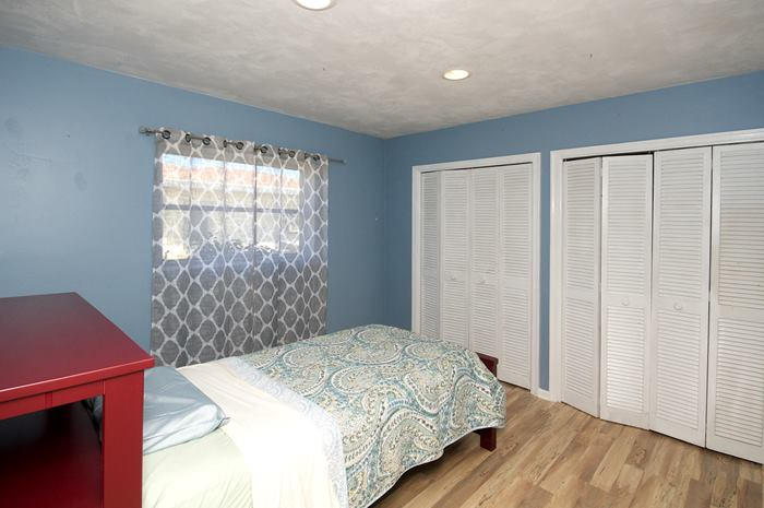 4881 Northwest 5th Terrace Boca Raton, FL 33431 - Photo 7 of 13 a bedroom with a bed and a window