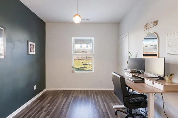 a workspace with wooden floor