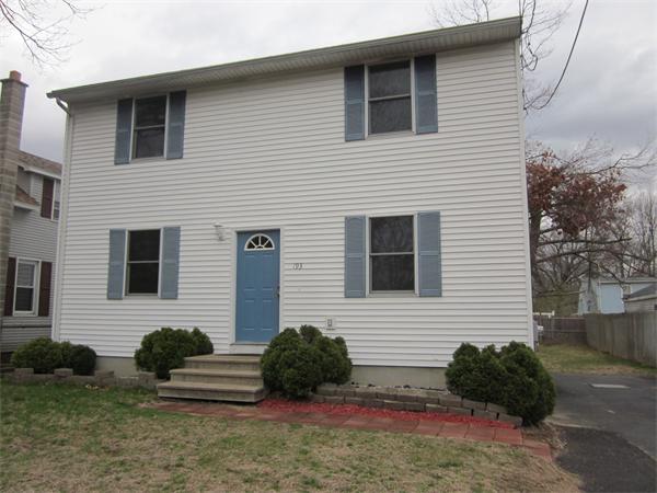 193 Wrentham Road Springfield, MA 01119 - Photo 1 of 12 a view of a house with a yard