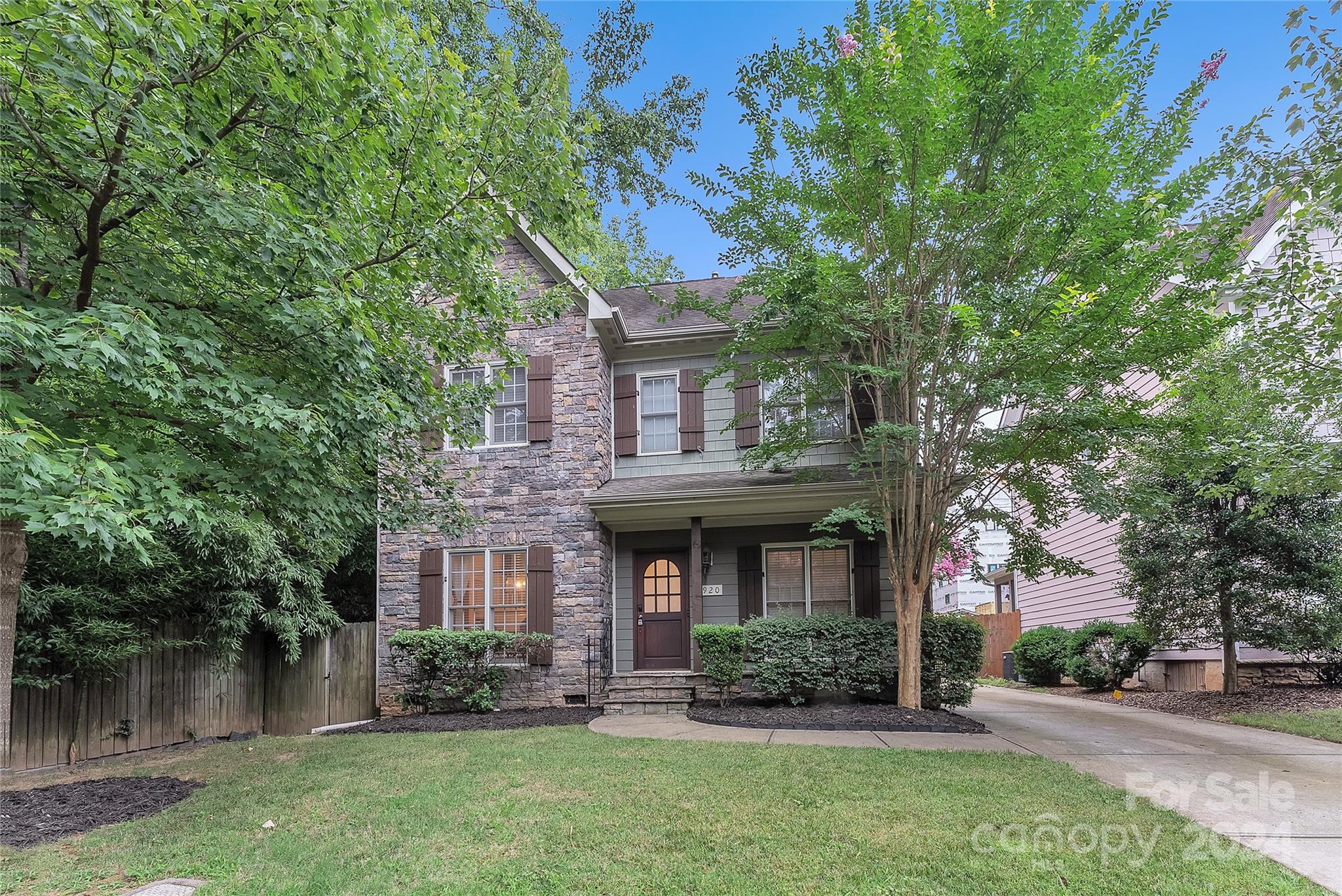 920 Millbrook Road Charlotte, NC 28211 - Photo 1 of 48 front view of a brick house with a yard