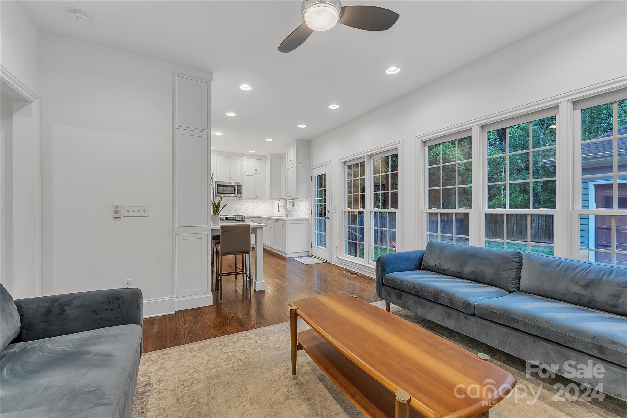 920 Millbrook Road Charlotte, NC 28211 - Photo 12 of 48 a living room with furniture and a large window
