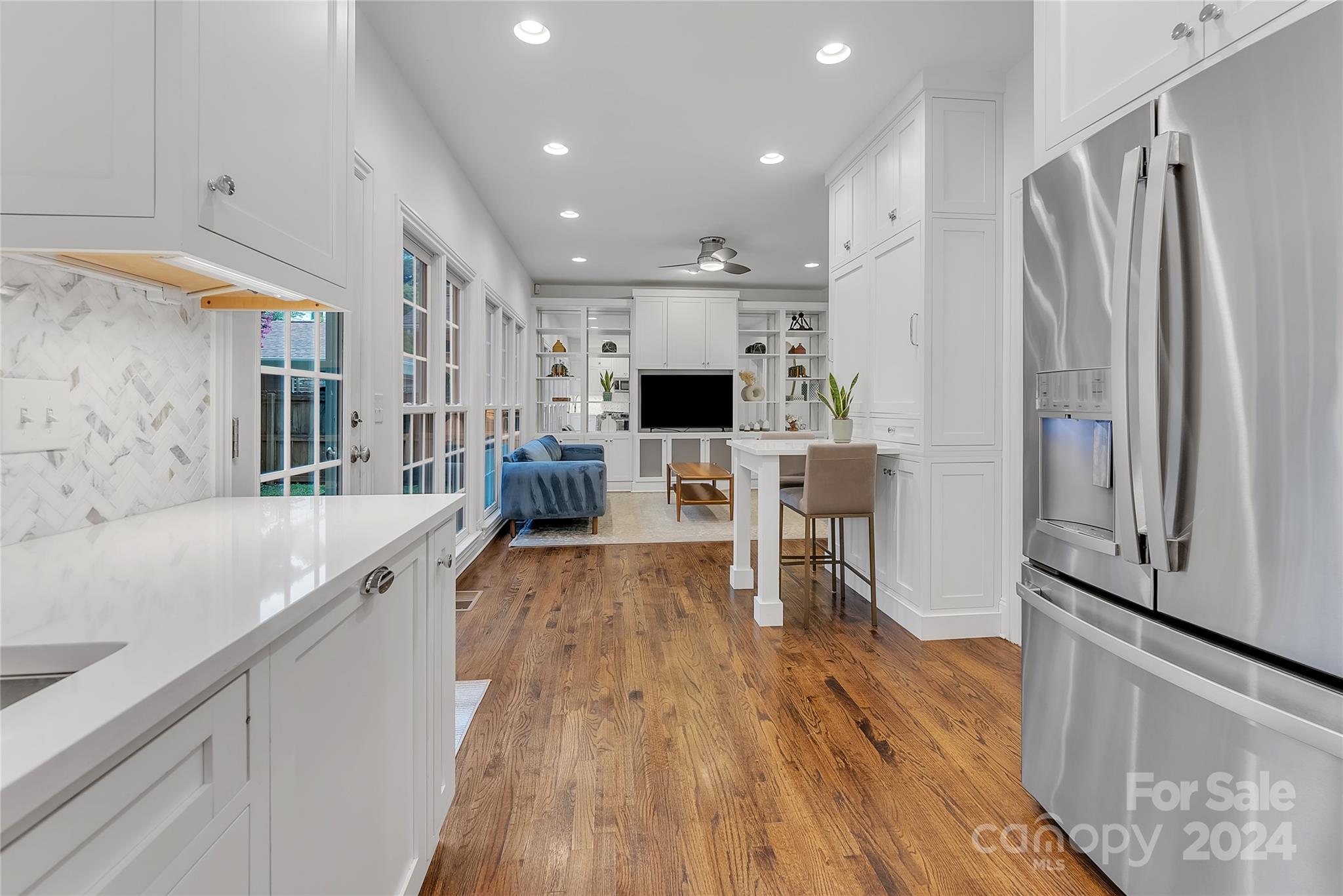 920 Millbrook Road Charlotte, NC 28211 - Photo 14 of 48 a view of kitchen with furniture and wooden floor