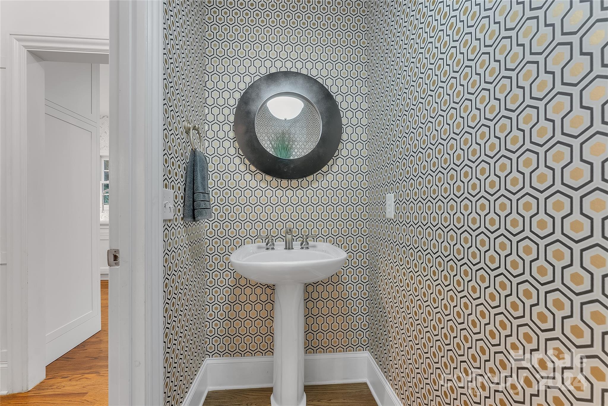 920 Millbrook Road Charlotte, NC 28211 - Photo 20 of 48 a bathroom with a sink and a mirror