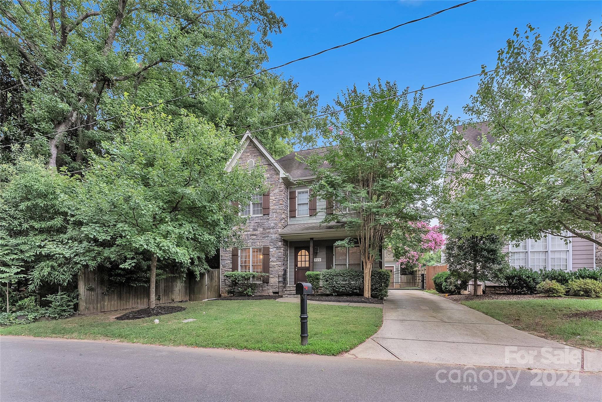920 Millbrook Road Charlotte, NC 28211 - Photo 2 of 48 a front view of a house with garden