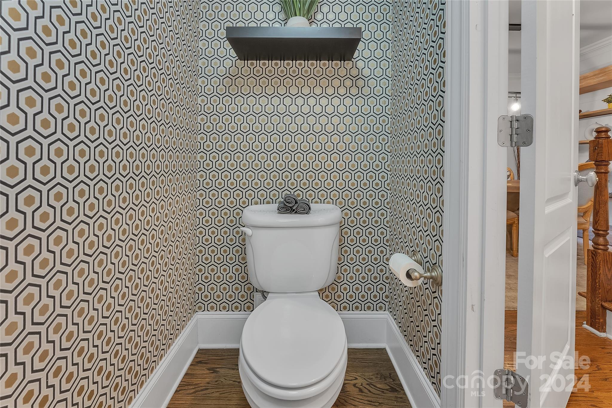 920 Millbrook Road Charlotte, NC 28211 - Photo 21 of 48 a white toilet sitting next to a white wall