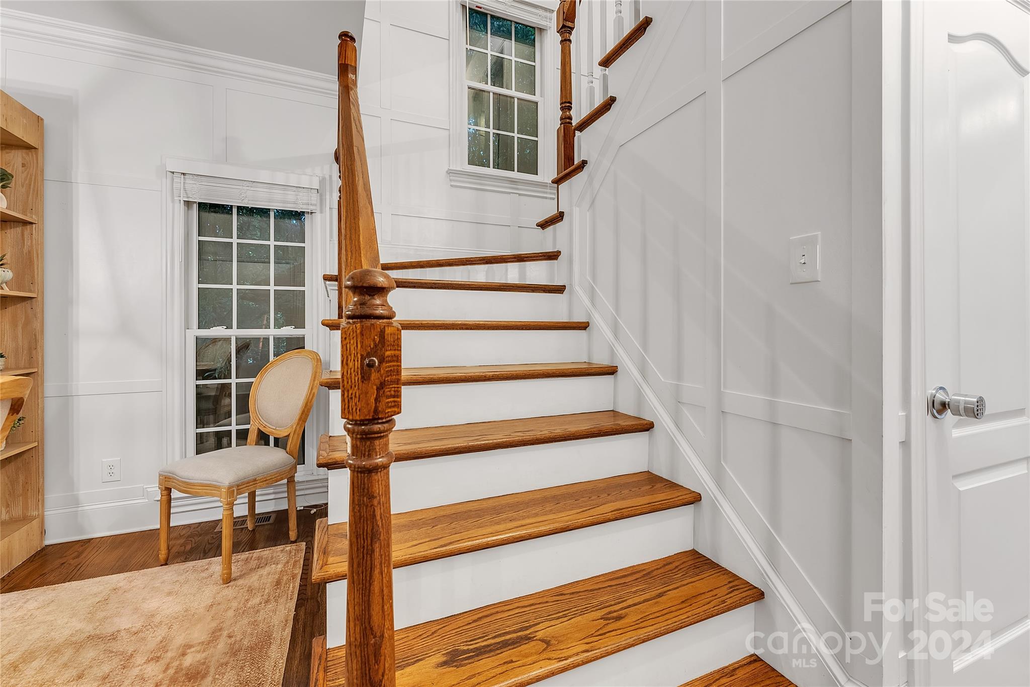 920 Millbrook Road Charlotte, NC 28211 - Photo 23 of 48 a view of entryway with wooden floor and a front door