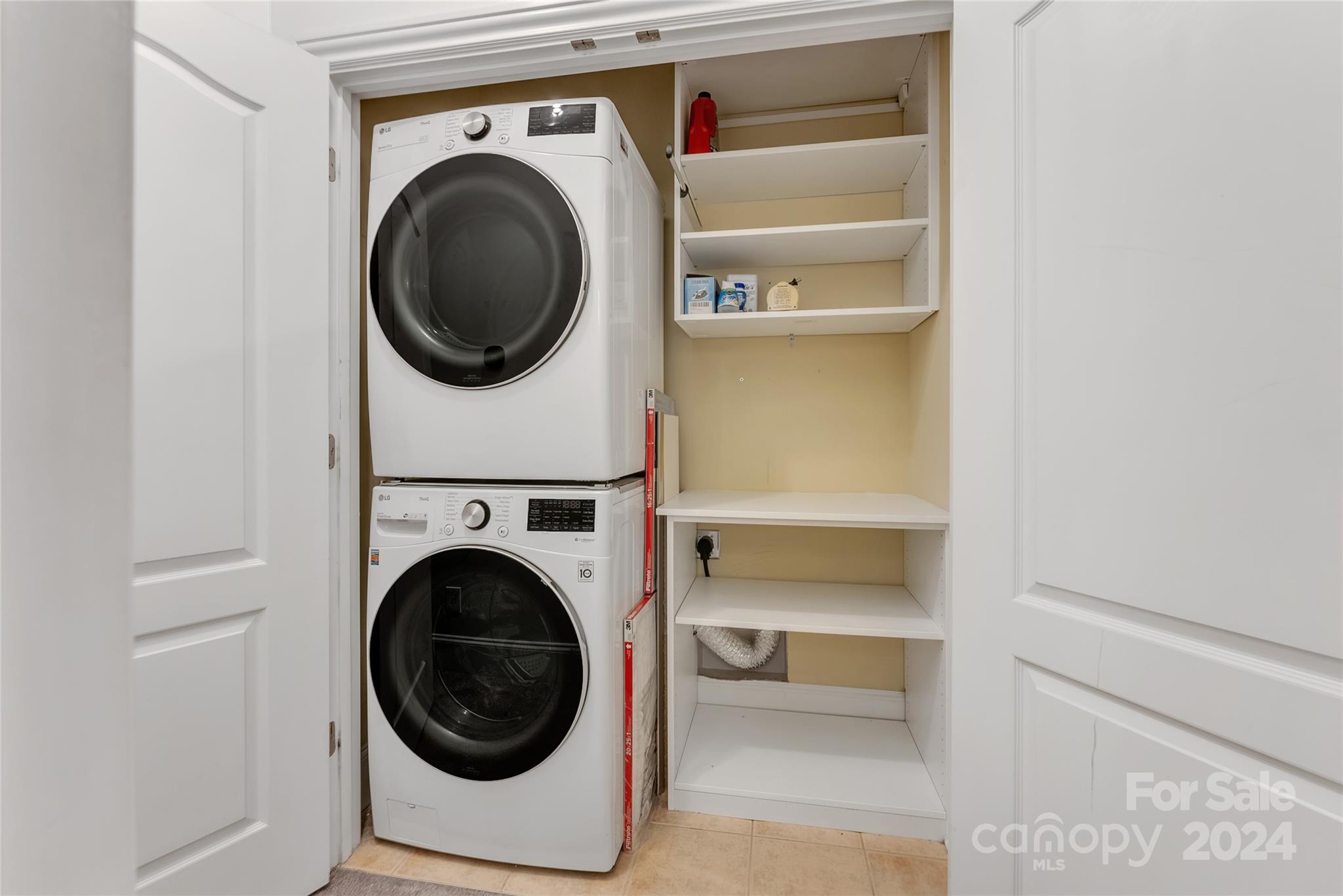 920 Millbrook Road Charlotte, NC 28211 - Photo 40 of 48 a utility room with dryer and washer