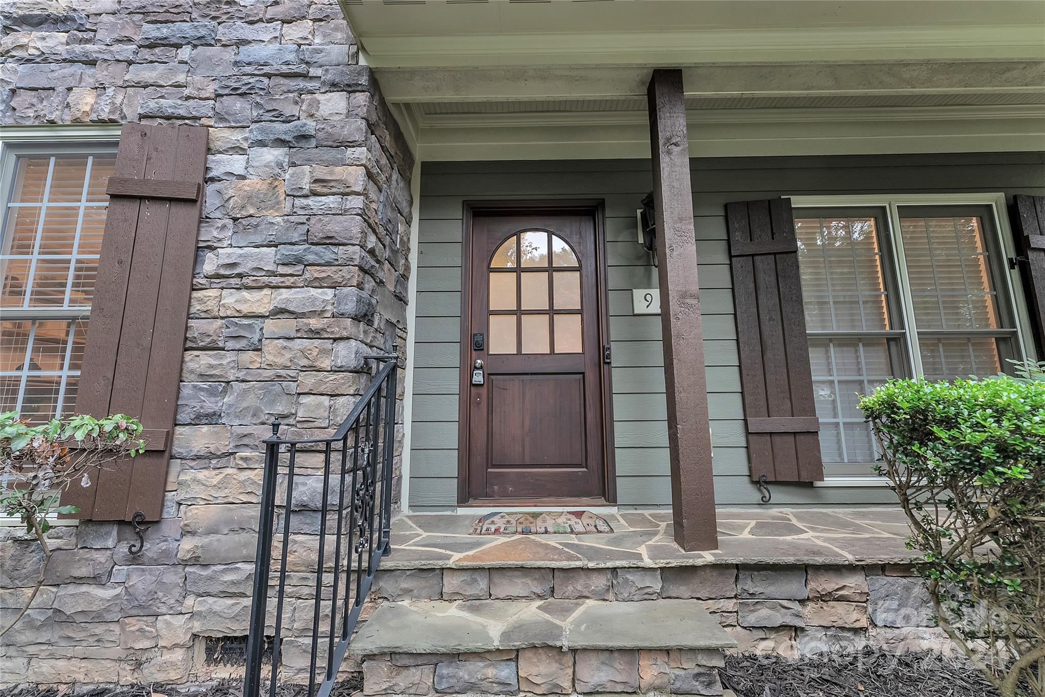 920 Millbrook Road Charlotte, NC 28211 - Photo 4 of 48 a front view of a house with a garden