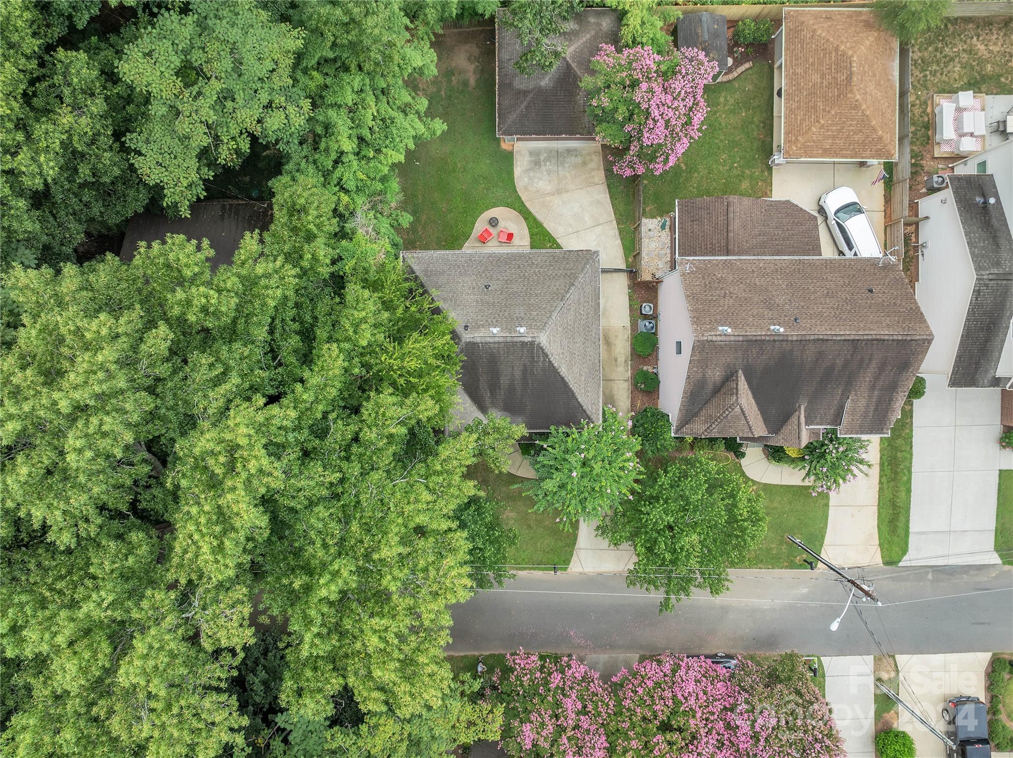 920 Millbrook Road Charlotte, NC 28211 - Photo 48 of 48 an aerial view of a house with a yard and potted plants