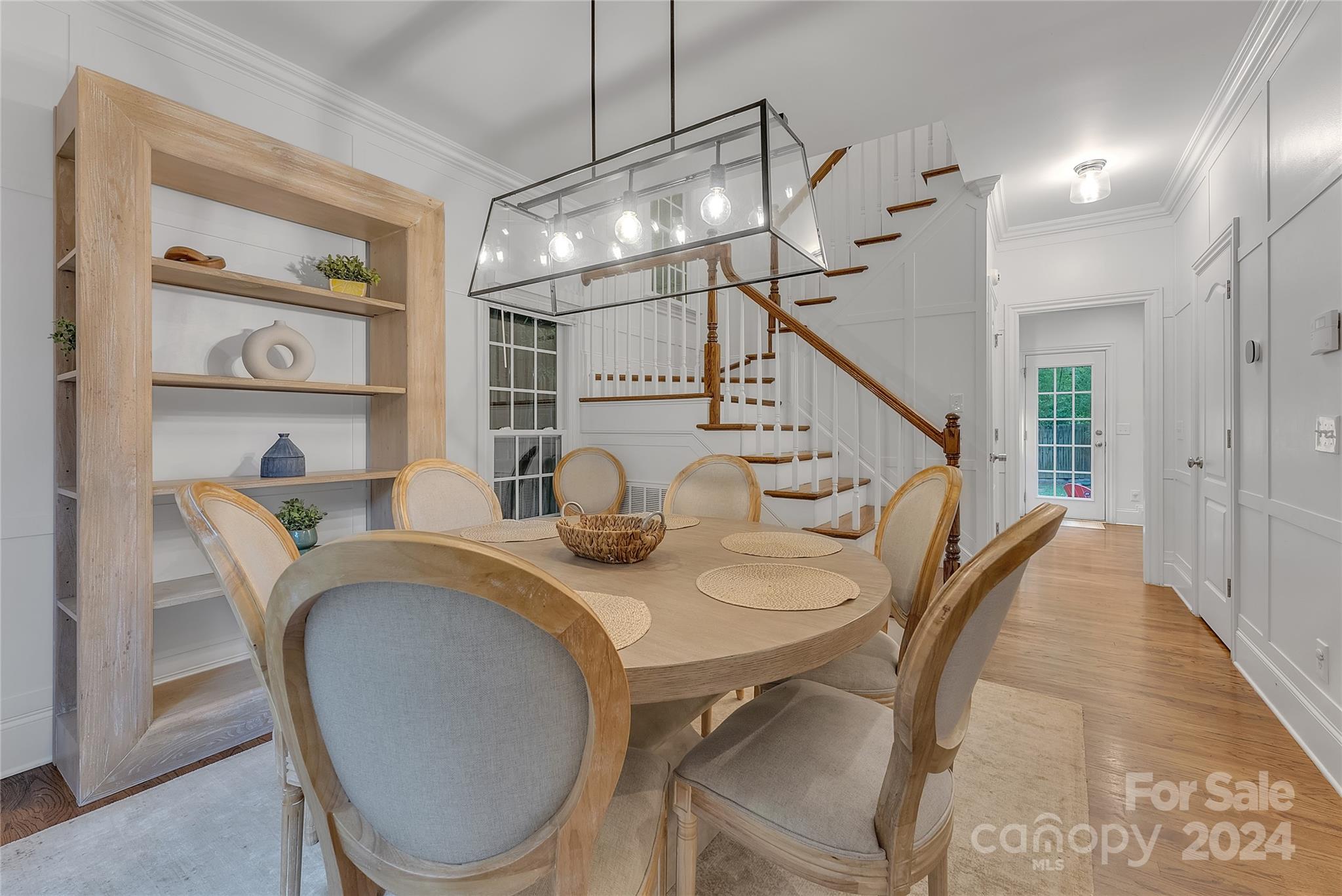 920 Millbrook Road Charlotte, NC 28211 - Photo 9 of 48 a dining room with furniture and wooden floor