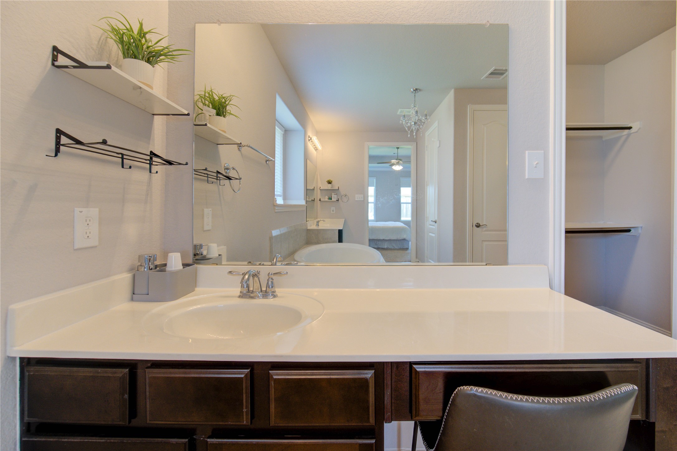 13838 Sturcombe Gln Trail Rosharon, TX 77583 - Photo 23 of 44 a bathroom with a sink and a mirror