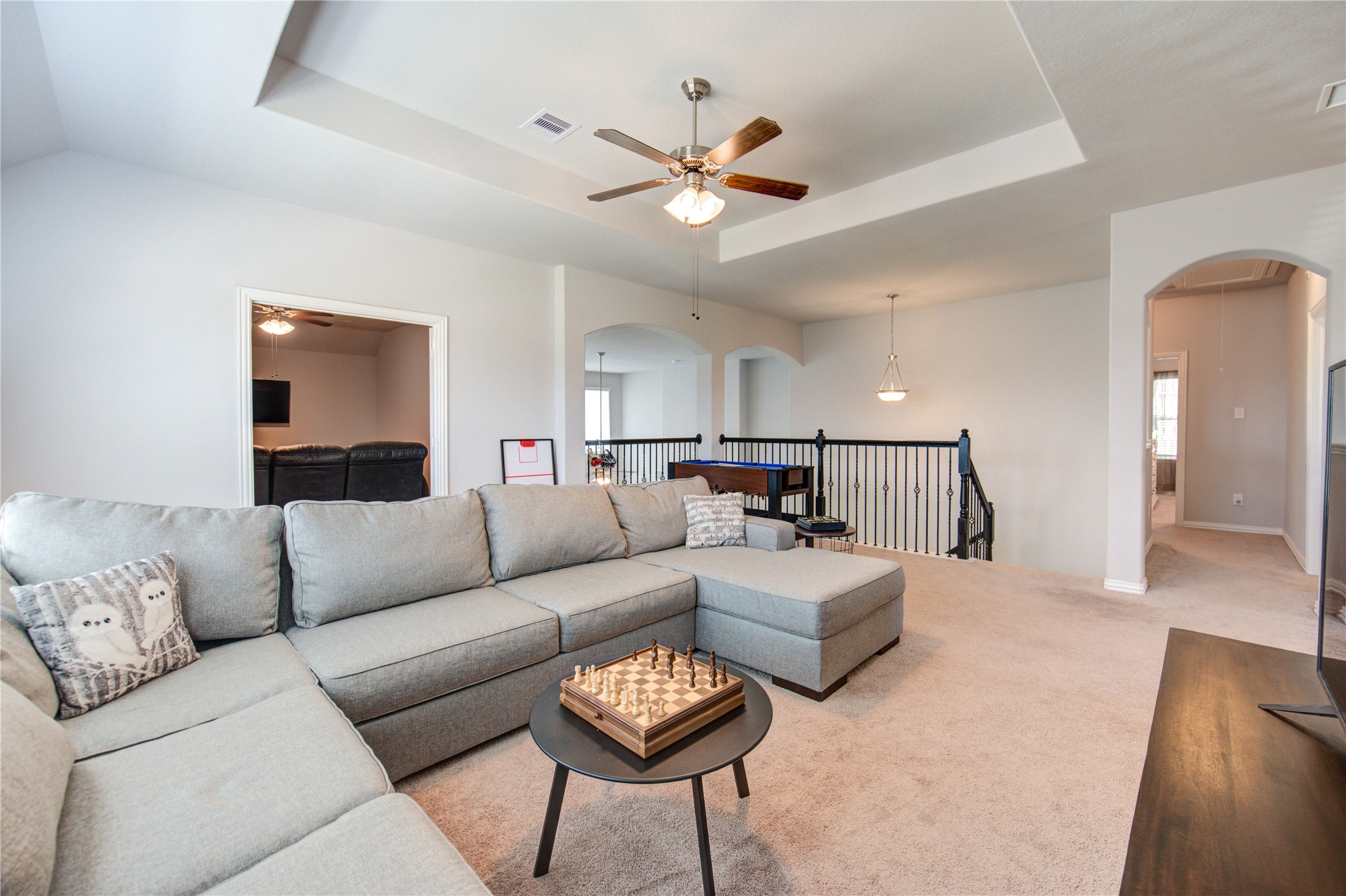 13838 Sturcombe Gln Trail Rosharon, TX 77583 - Photo 29 of 44 a living room with furniture and a view of kitchen