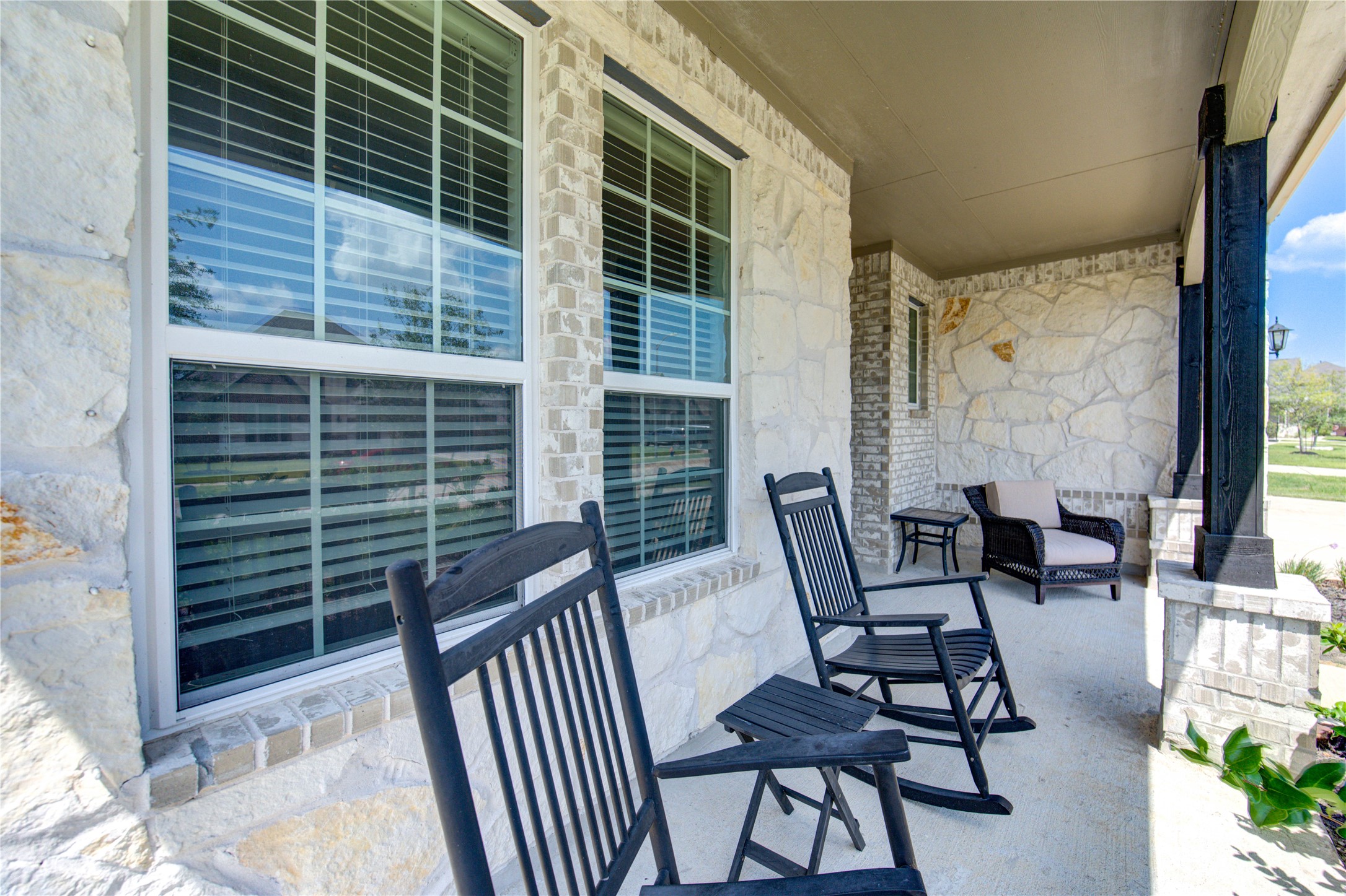 13838 Sturcombe Gln Trail Rosharon, TX 77583 - Photo 3 of 44 a view of balcony with two chairs and a potted plant