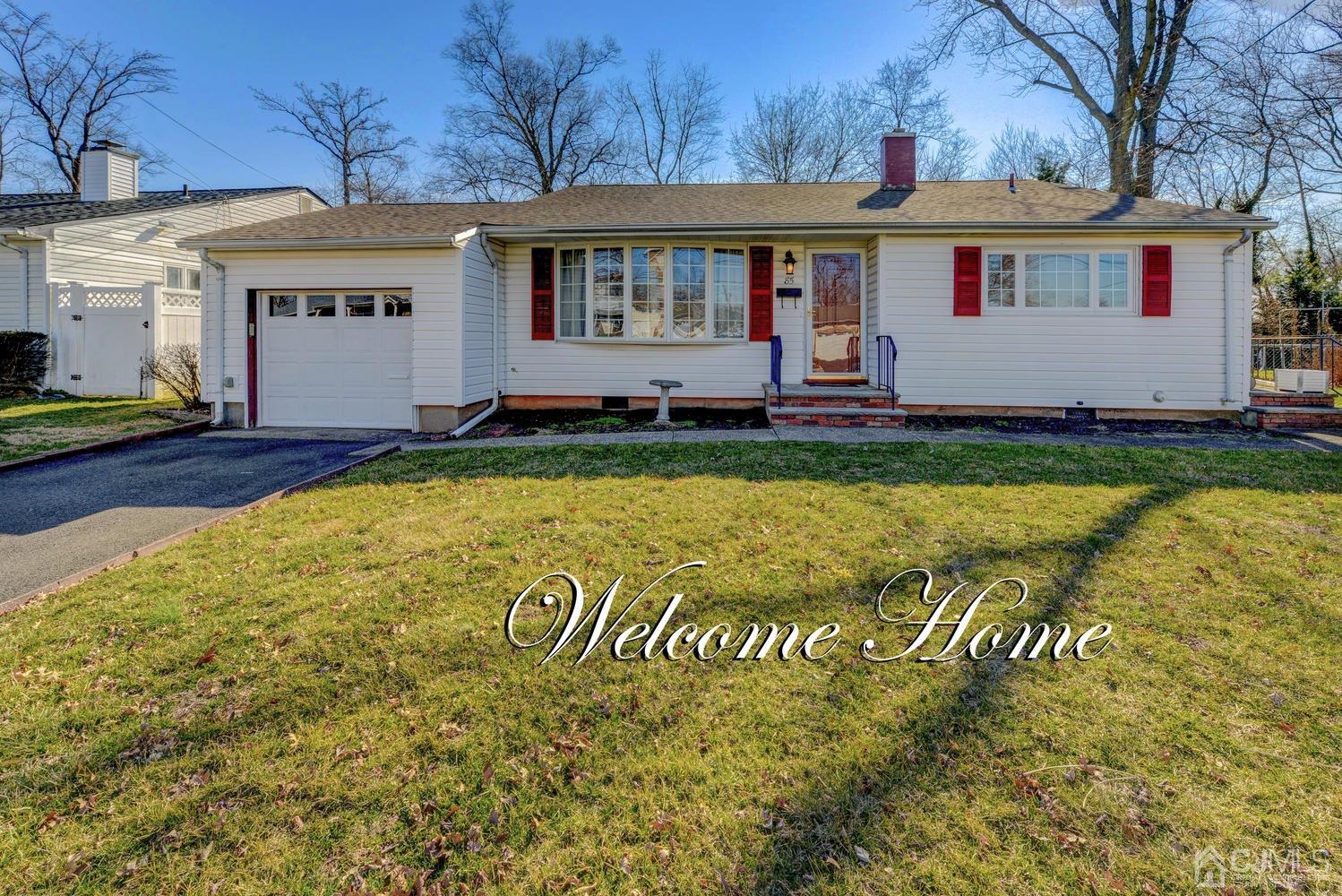 85 Albemarle Road Colonia, NJ 07067 - Photo 1 of 29 a view of a house with garden