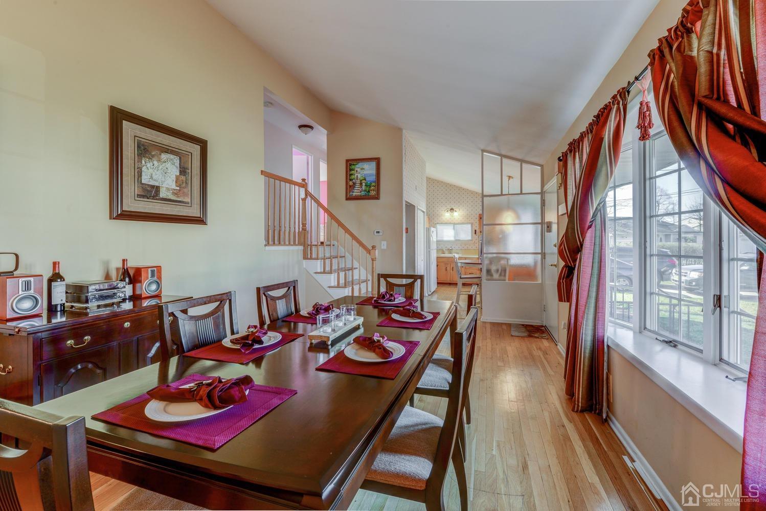 85 Albemarle Road Colonia, NJ 07067 - Photo 12 of 29 a view of a dining room with furniture window and wooden floor