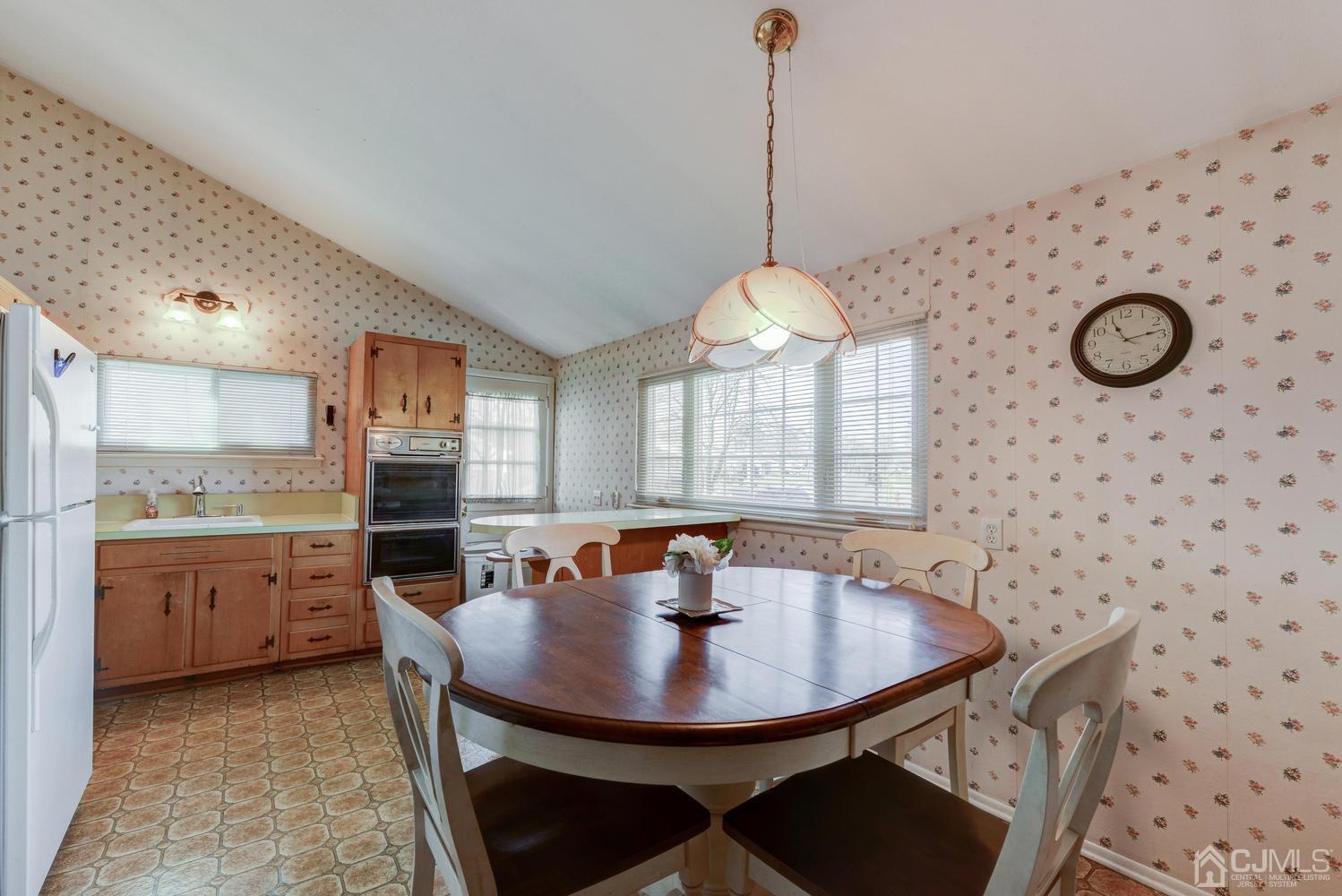 85 Albemarle Road Colonia, NJ 07067 - Photo 13 of 29 a view of a dining room with furniture and window