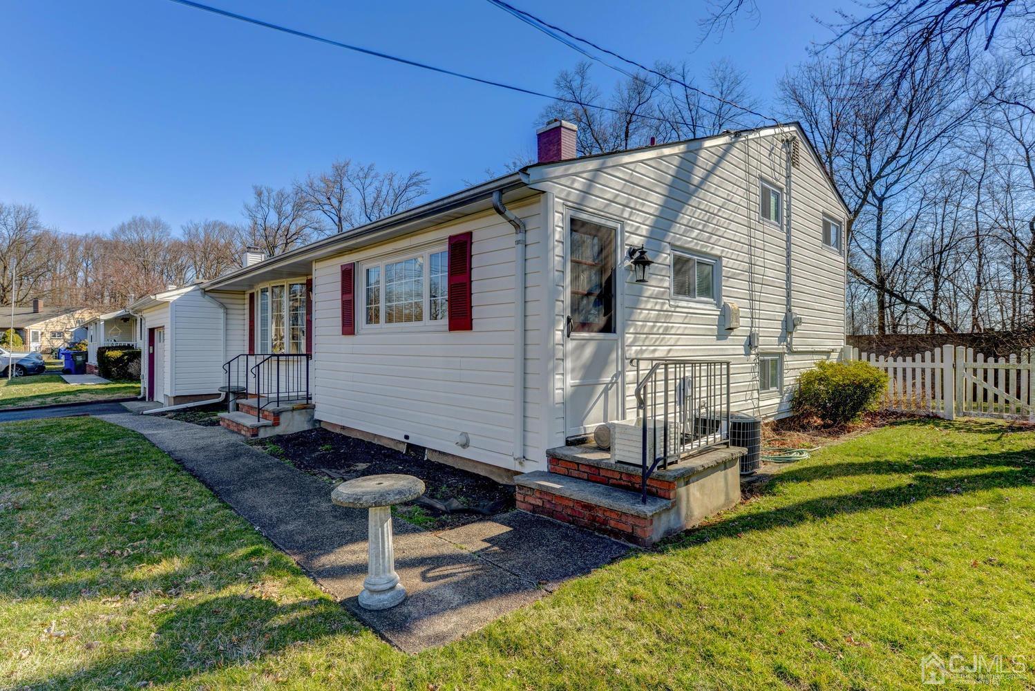 85 Albemarle Road Colonia, NJ 07067 - Photo 3 of 29 a view of a house with backyard