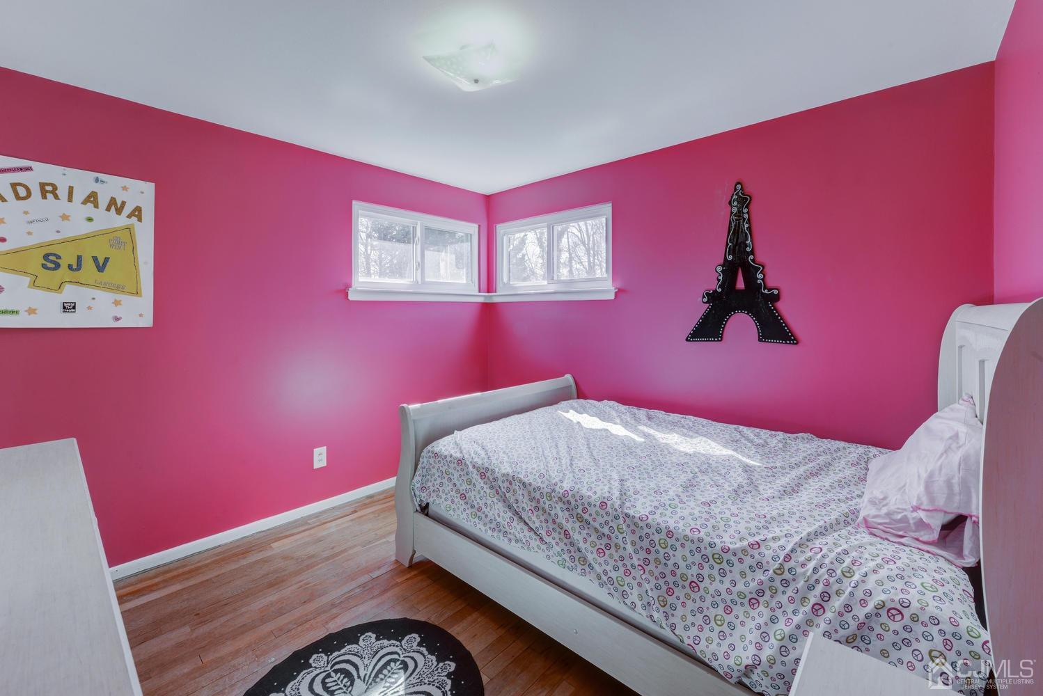 85 Albemarle Road Colonia, NJ 07067 - Photo 21 of 29 a bed room with a bed and a dresser