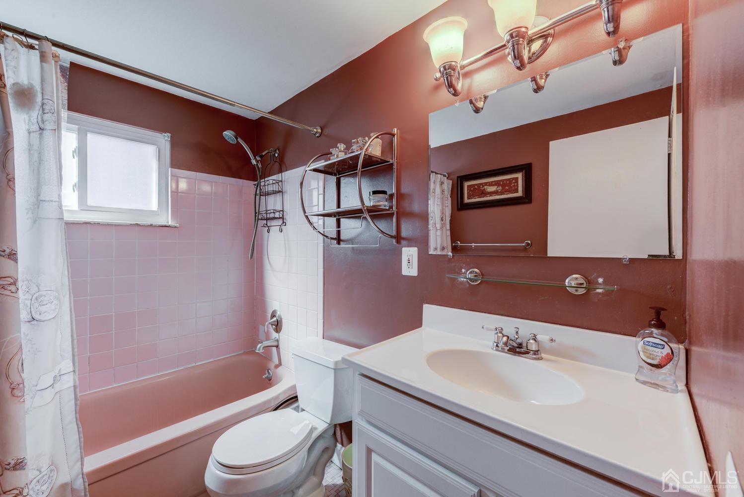 85 Albemarle Road Colonia, NJ 07067 - Photo 24 of 29 a bathroom with a sink toilet tub and shower