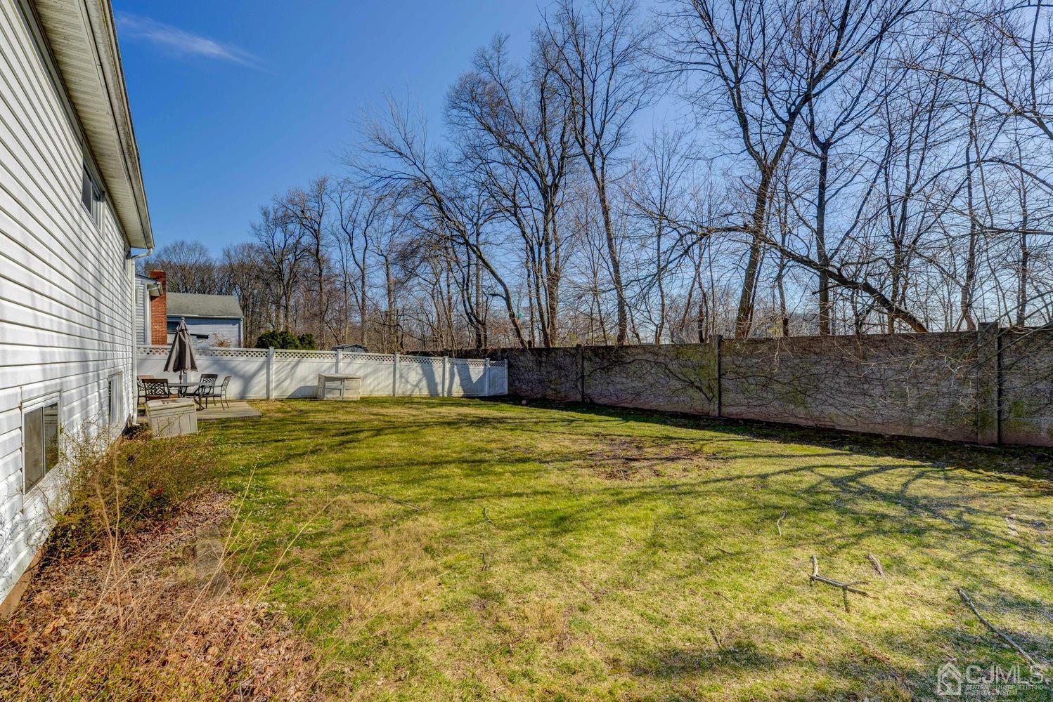 85 Albemarle Road Colonia, NJ 07067 - Photo 27 of 29 a view of swimming pool with an outdoor space and seating area